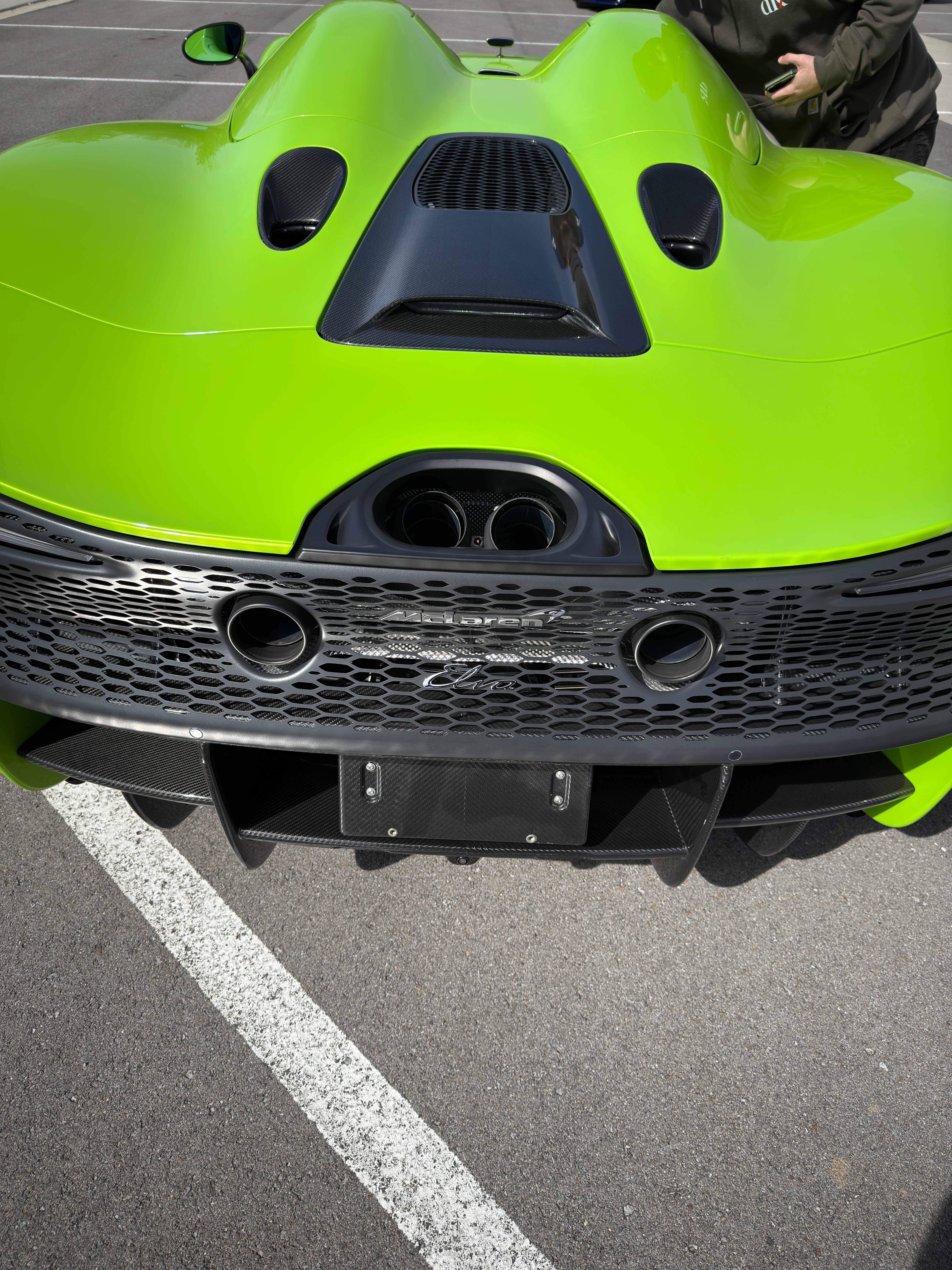 McLaren Elva in Napier Green shot from directly behind showing exhaust and diffuser