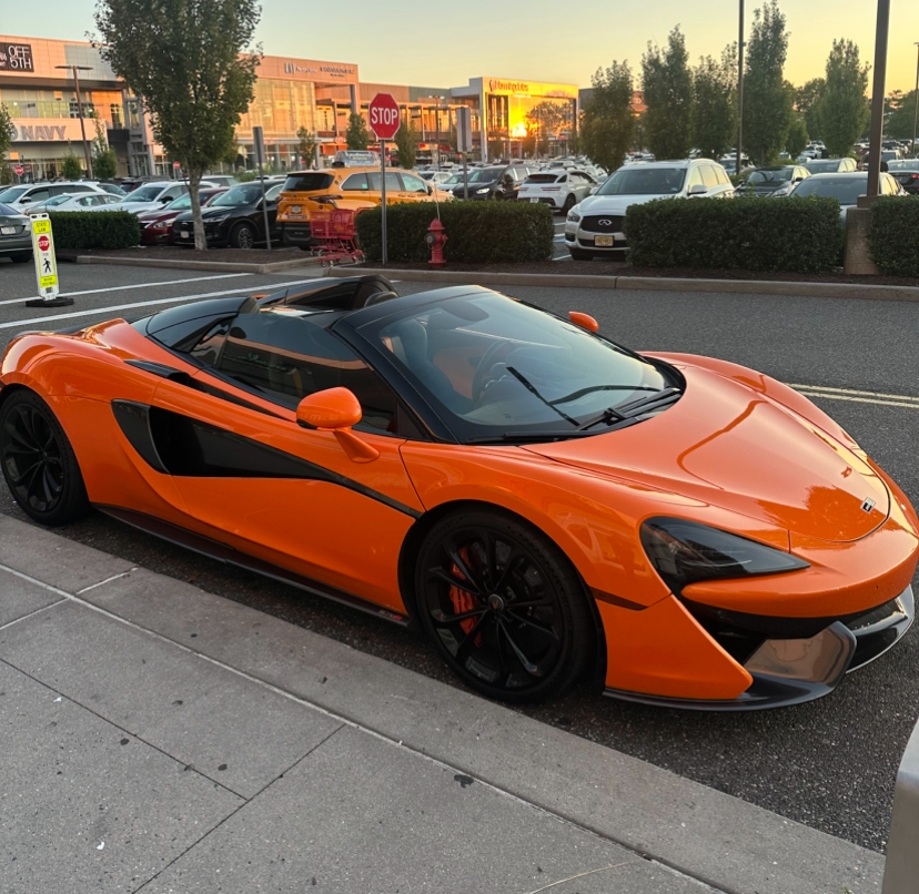 Orange McLaren sports car with stunning finish