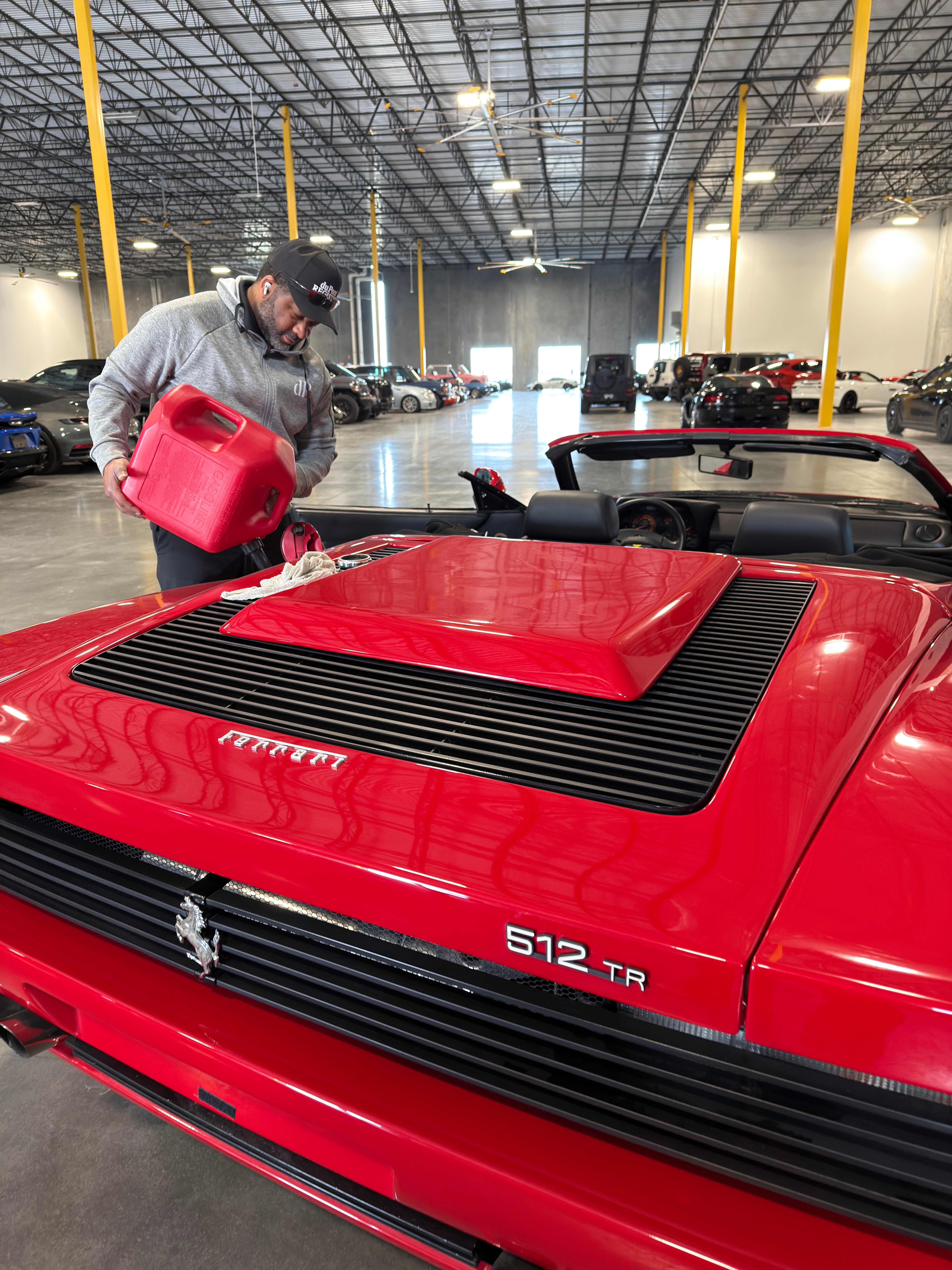 Ferrari 512 TR in Rosso Corsa being fueled, 512 TR badge prominent