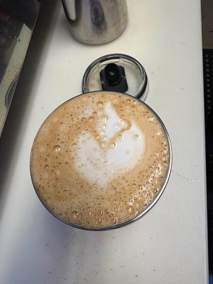 Fresh latte with heart latte art