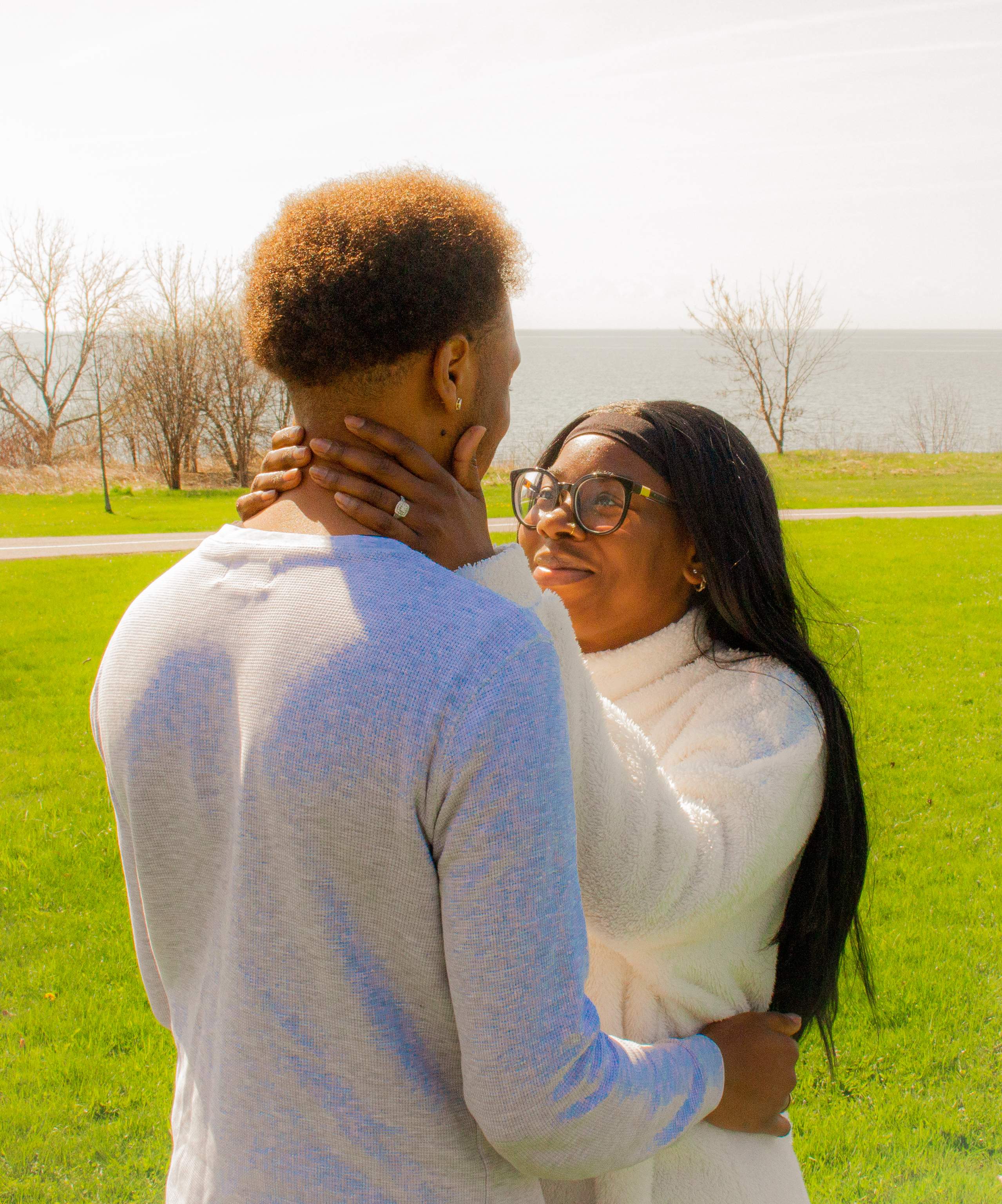 Couple embracing by the lake