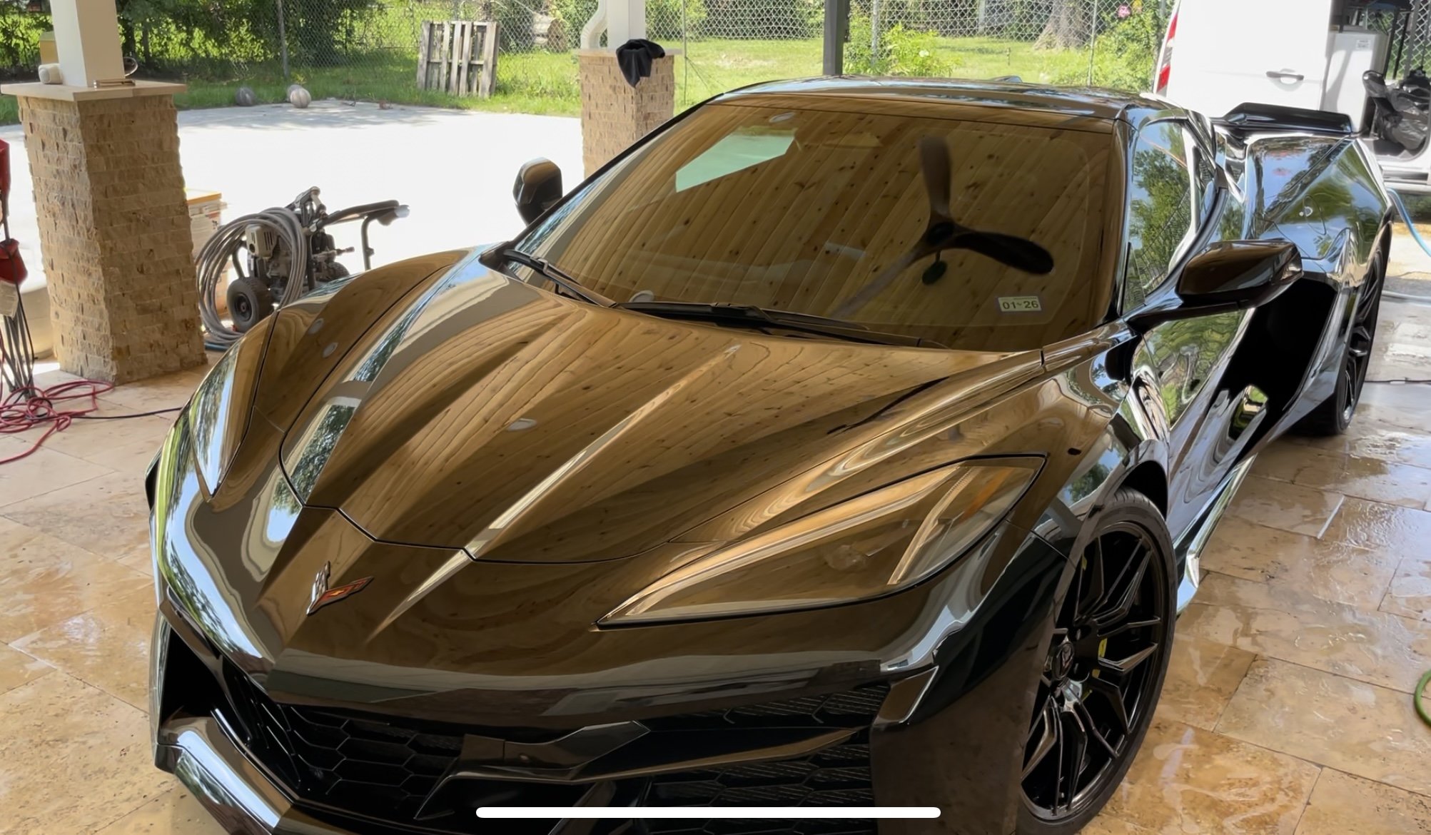 Black Corvette Z06 C8 with a flawless mirror gloss finish after a full detail