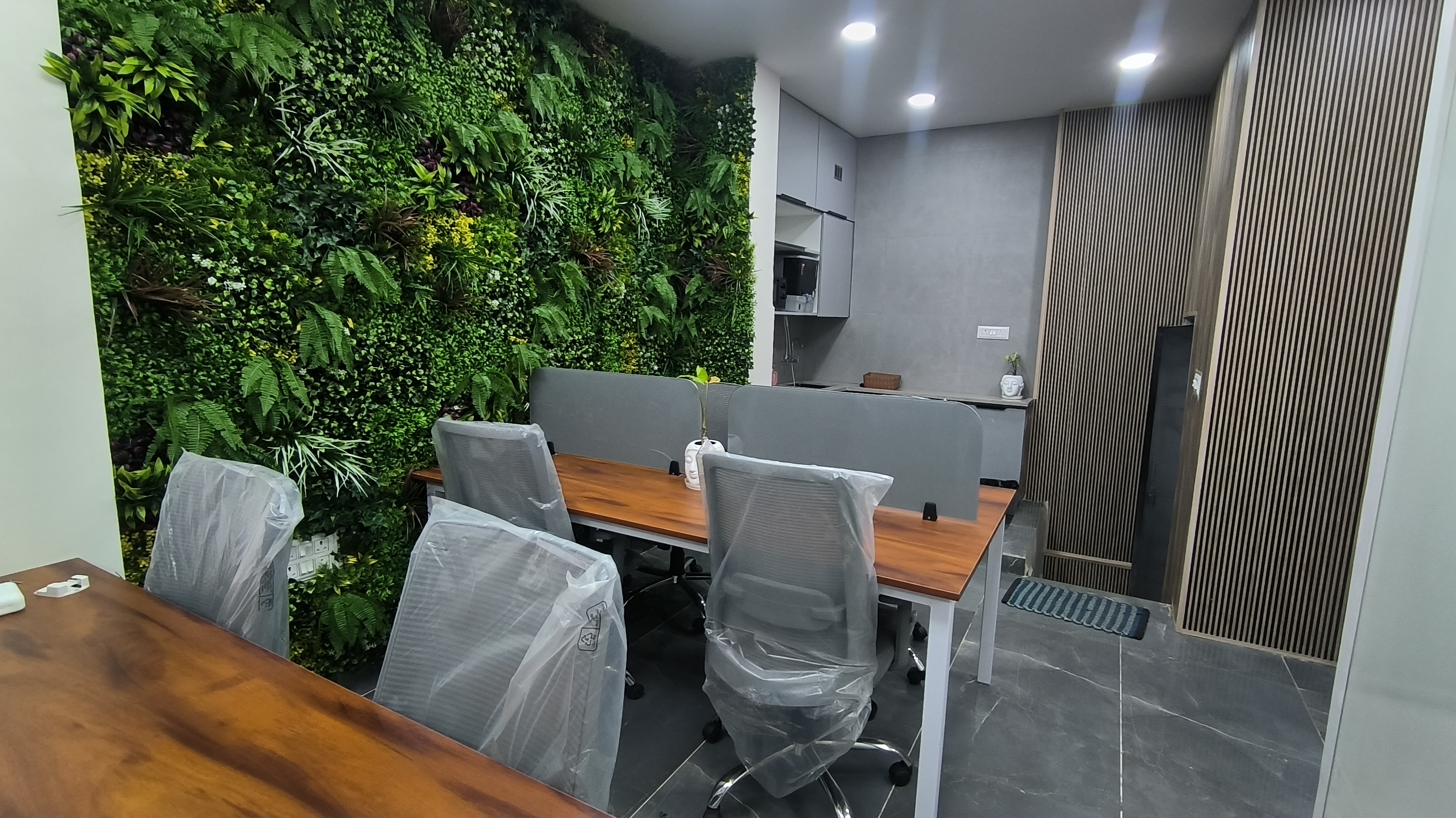 Workstation Area with Green Wall