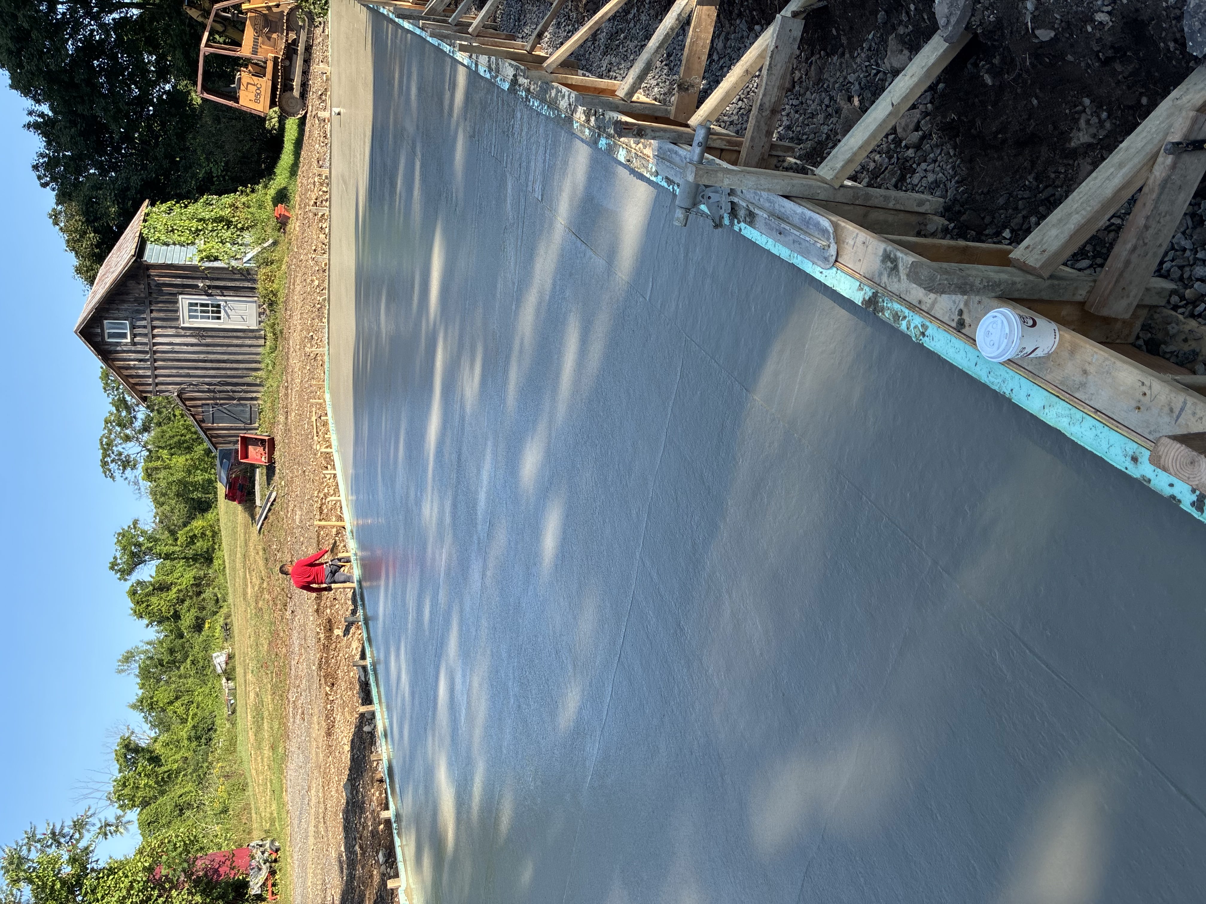Freshly poured and finished large concrete slab
