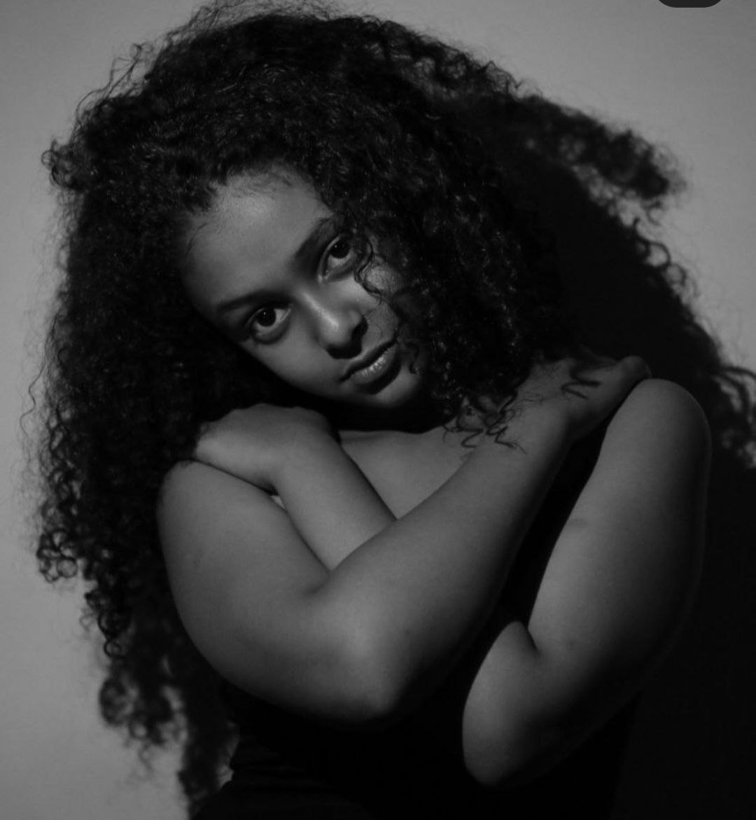 Black and white editorial portrait of a model