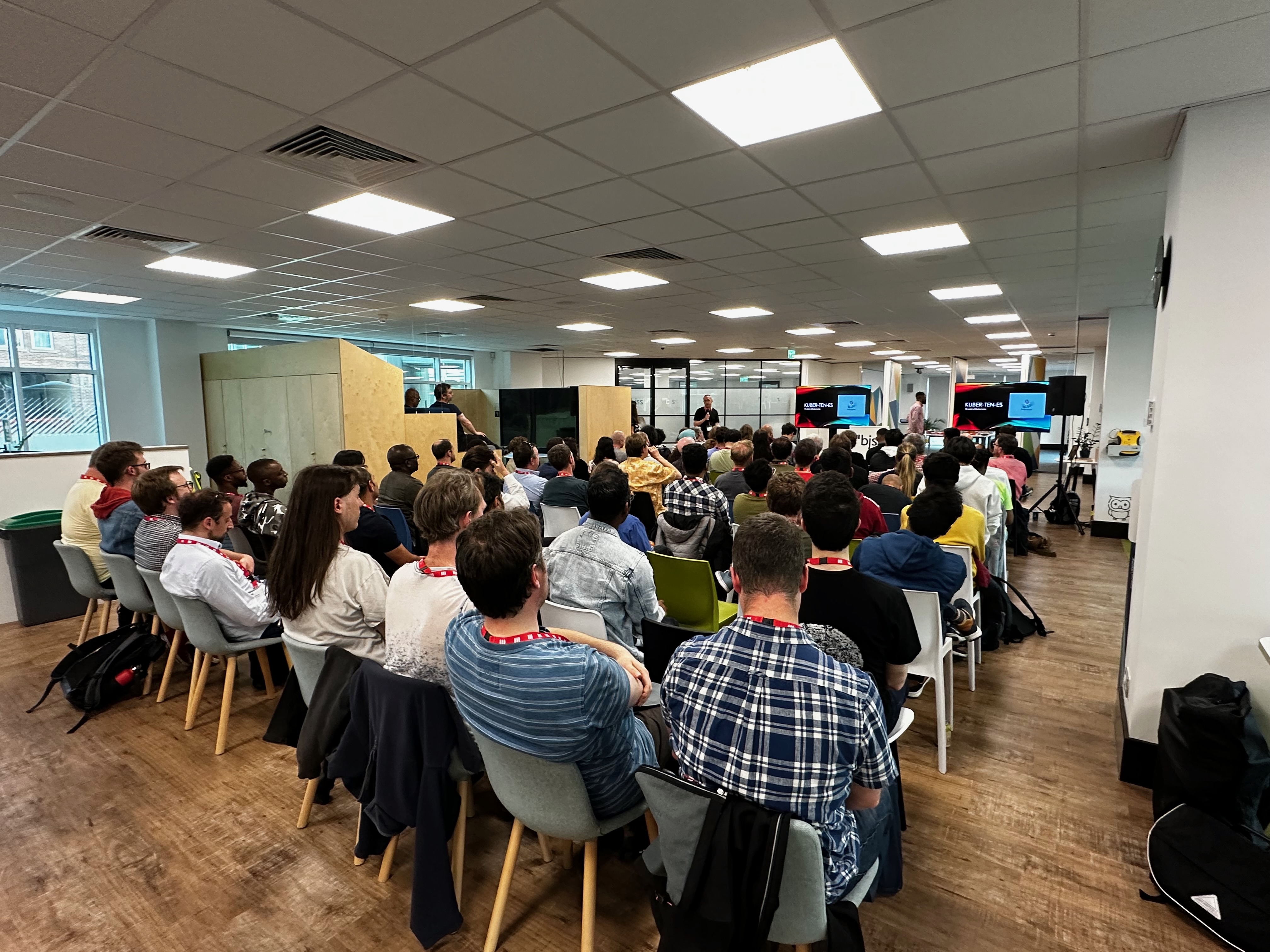 Large audience at a Kubernetes community meetup