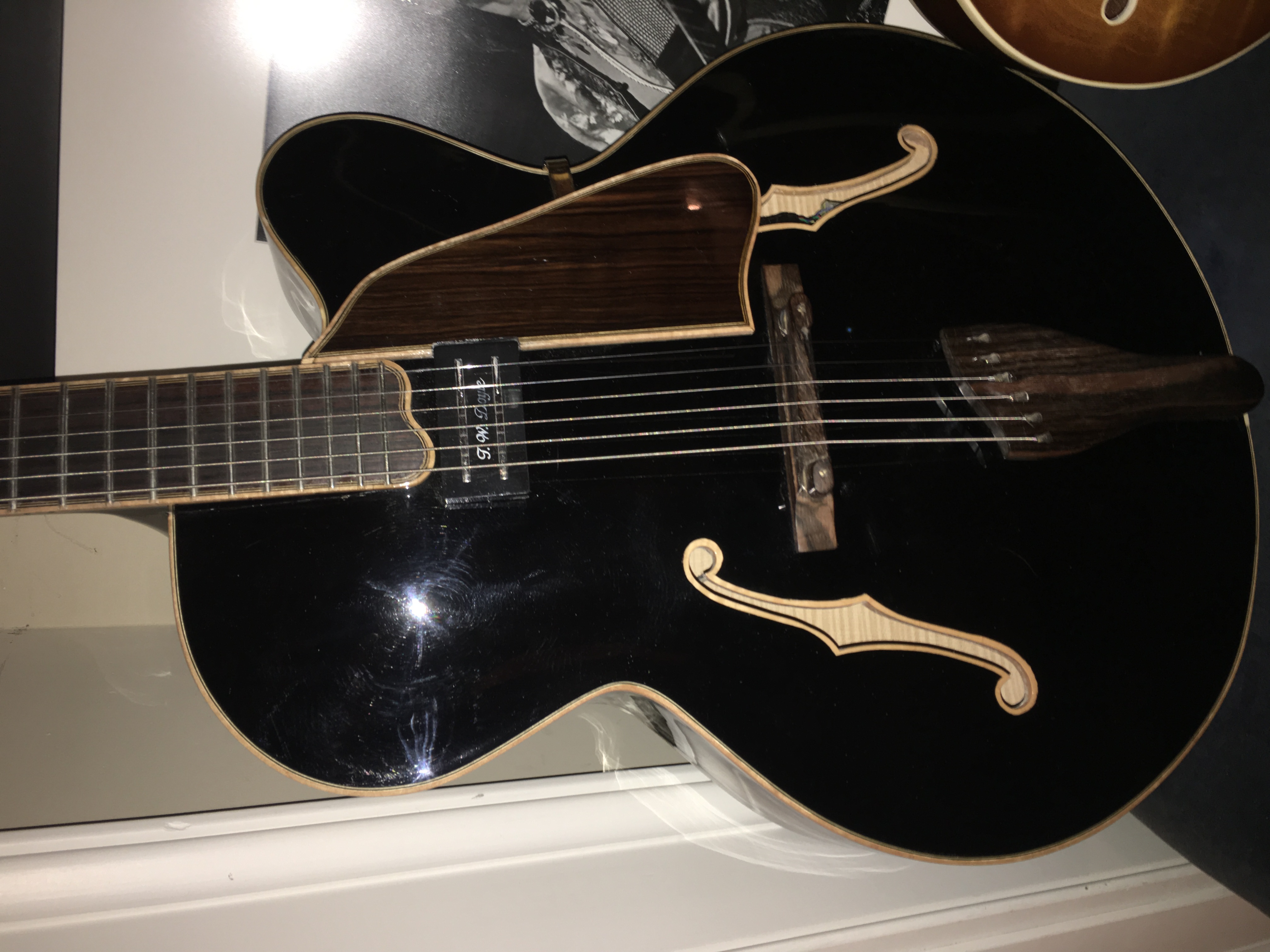 Black Archtop with Maple Binding