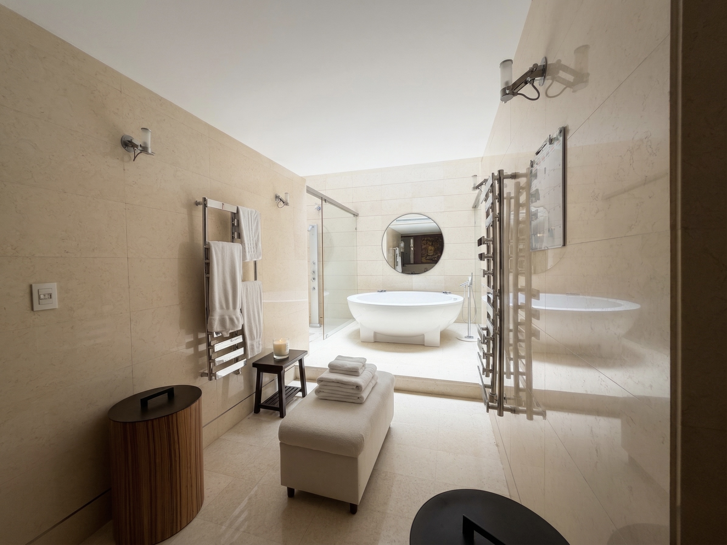 Luxurious spa bathroom with freestanding sculptural bathtub, marble walls and heated towel rails, ultra-luxury Caracas estate