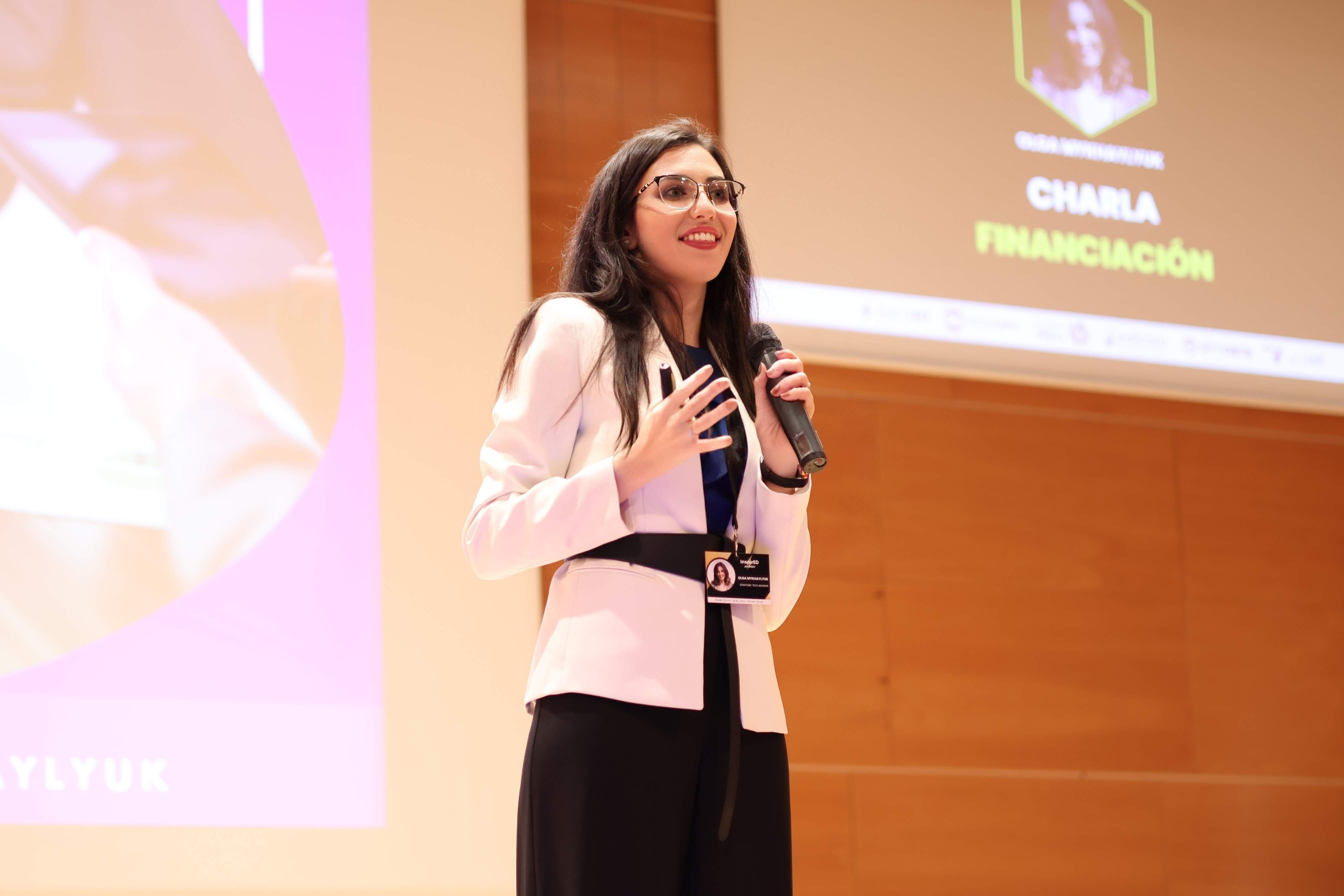 Olga Mykhaylyuk - Professional portrait speaking at conference