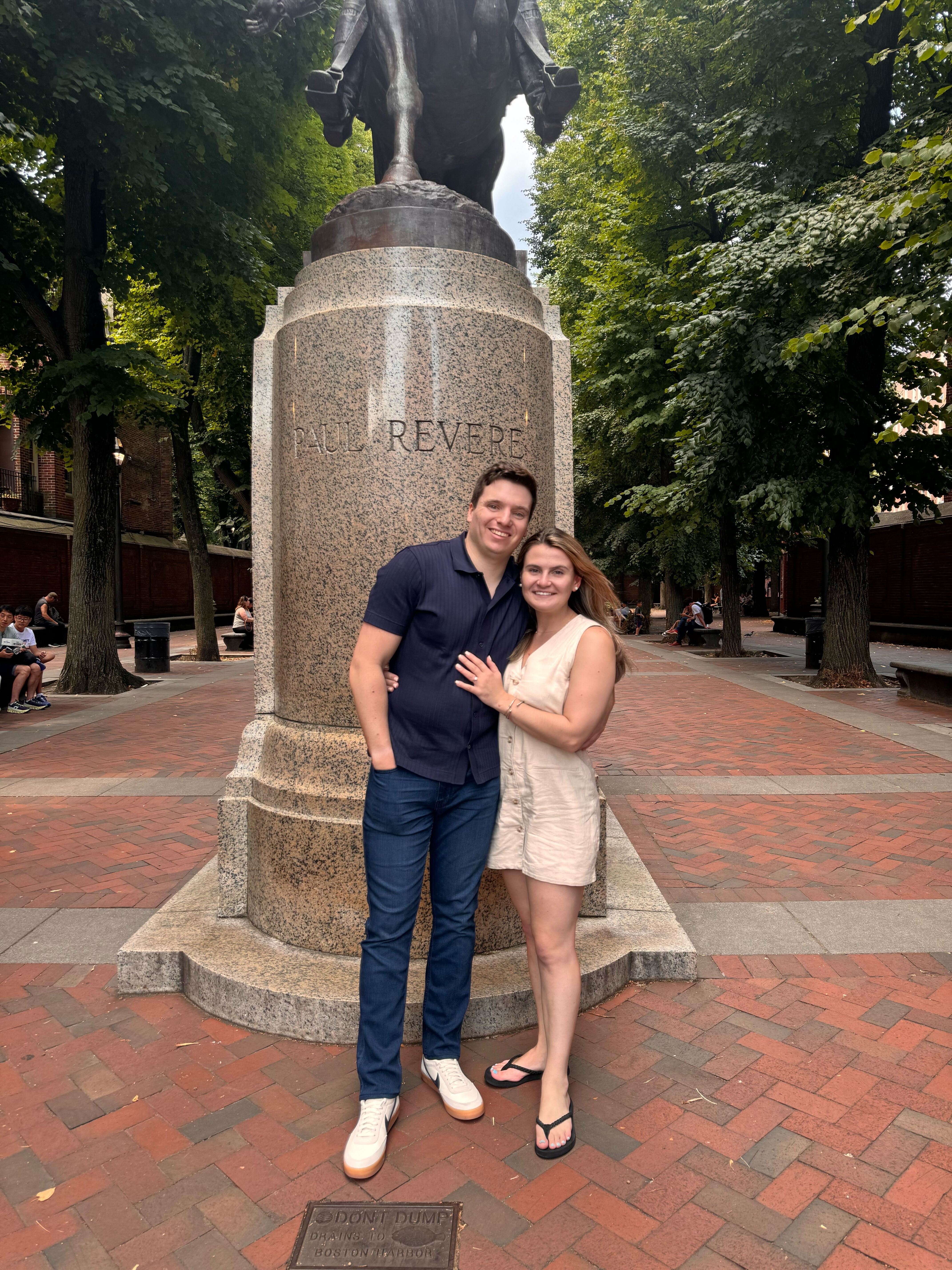 Ben and Brooke celebrating their engagement at the Paul Revere statue