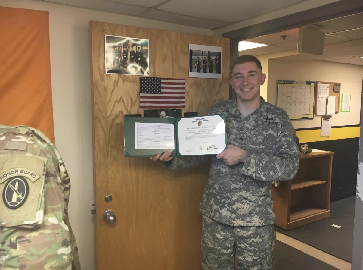 Rob Shull in his Army uniform receiving an award