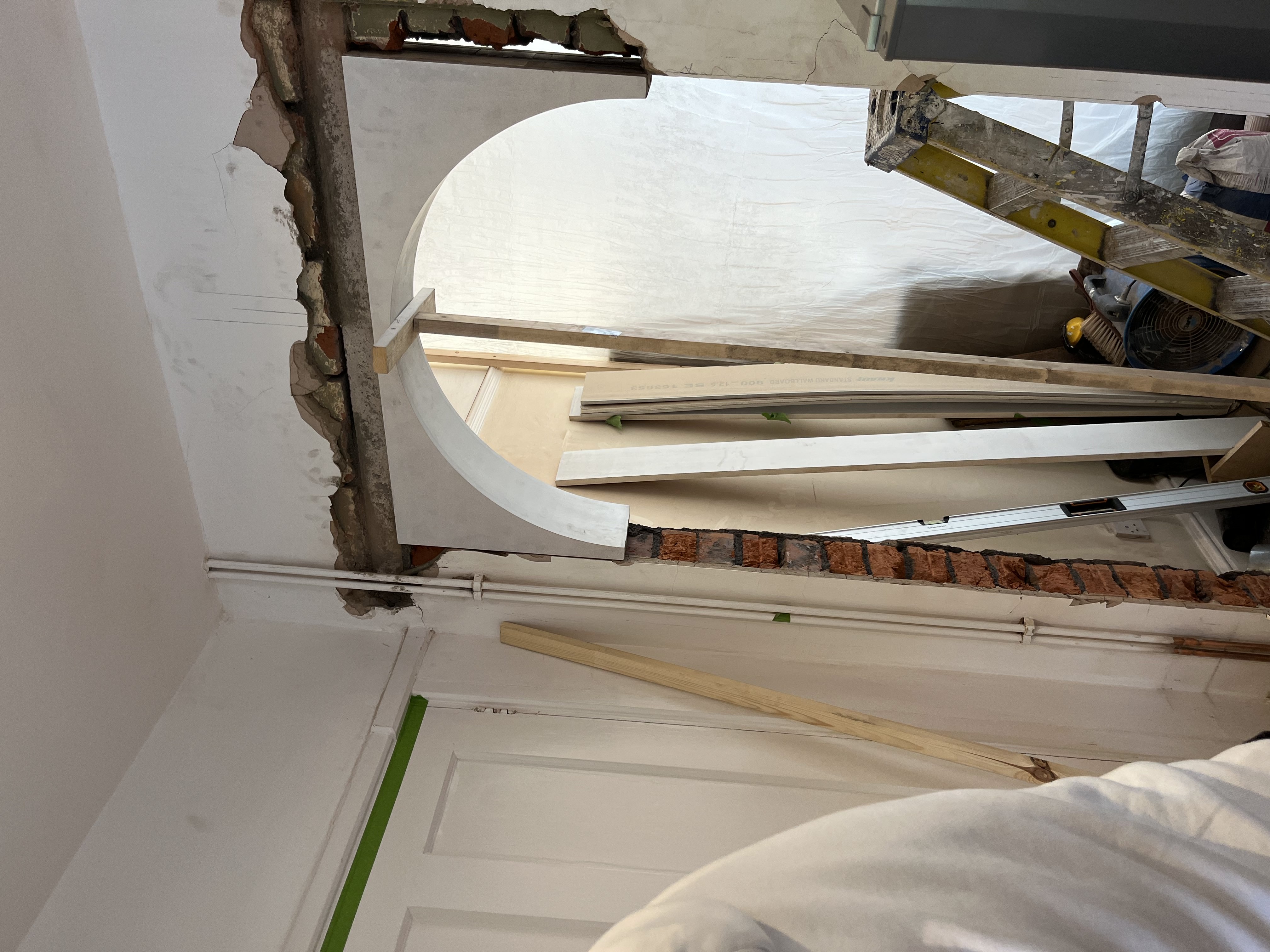Creating arched doorway for knock-through