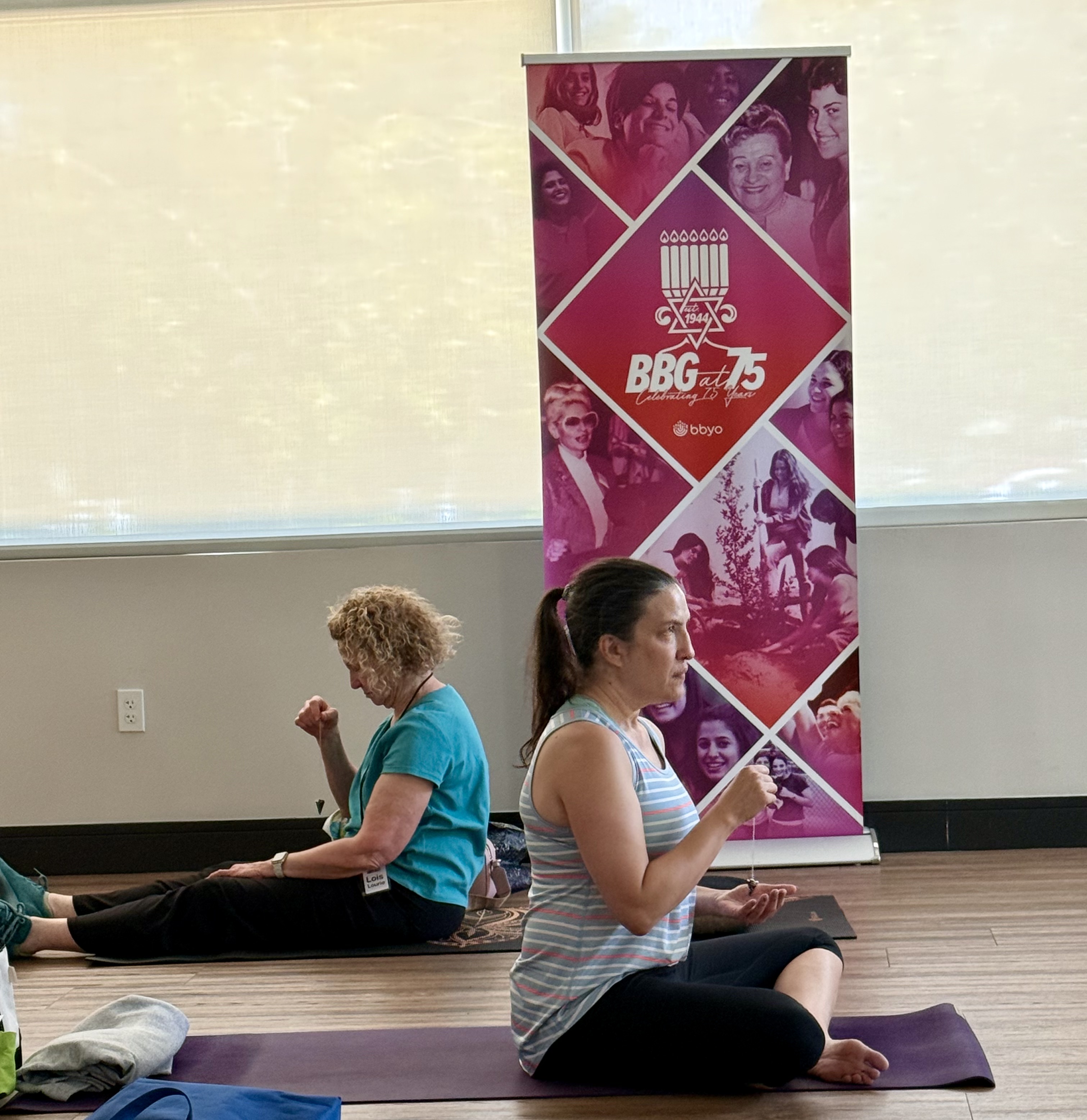 Students practicing meditation during an energy healing class