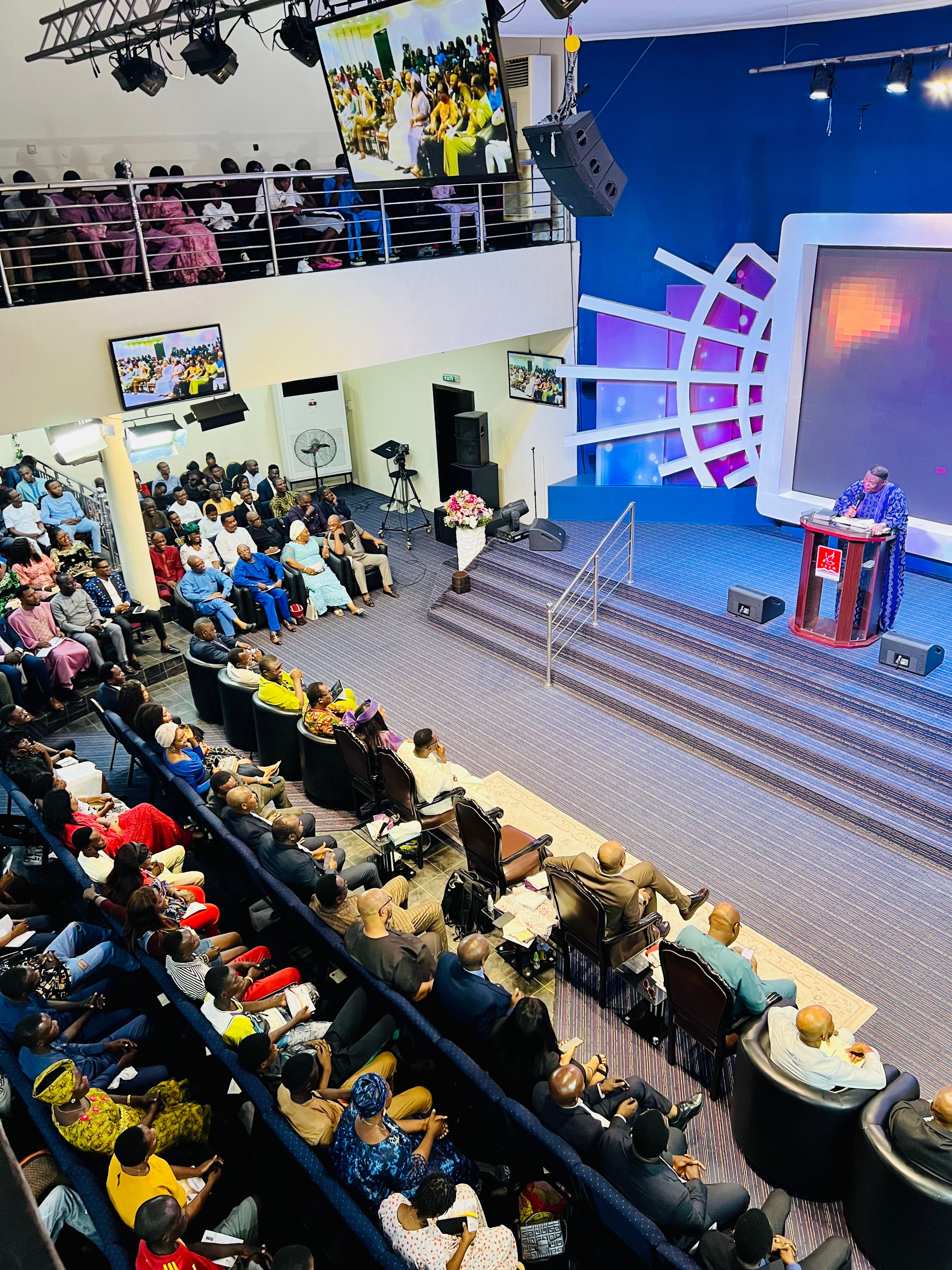 Aerial view of church auditorium with congregation and stage
