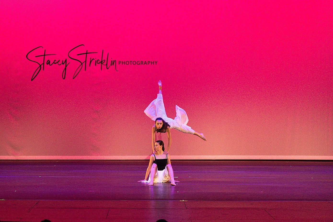 Two dancers performing an expressive contemporary duet