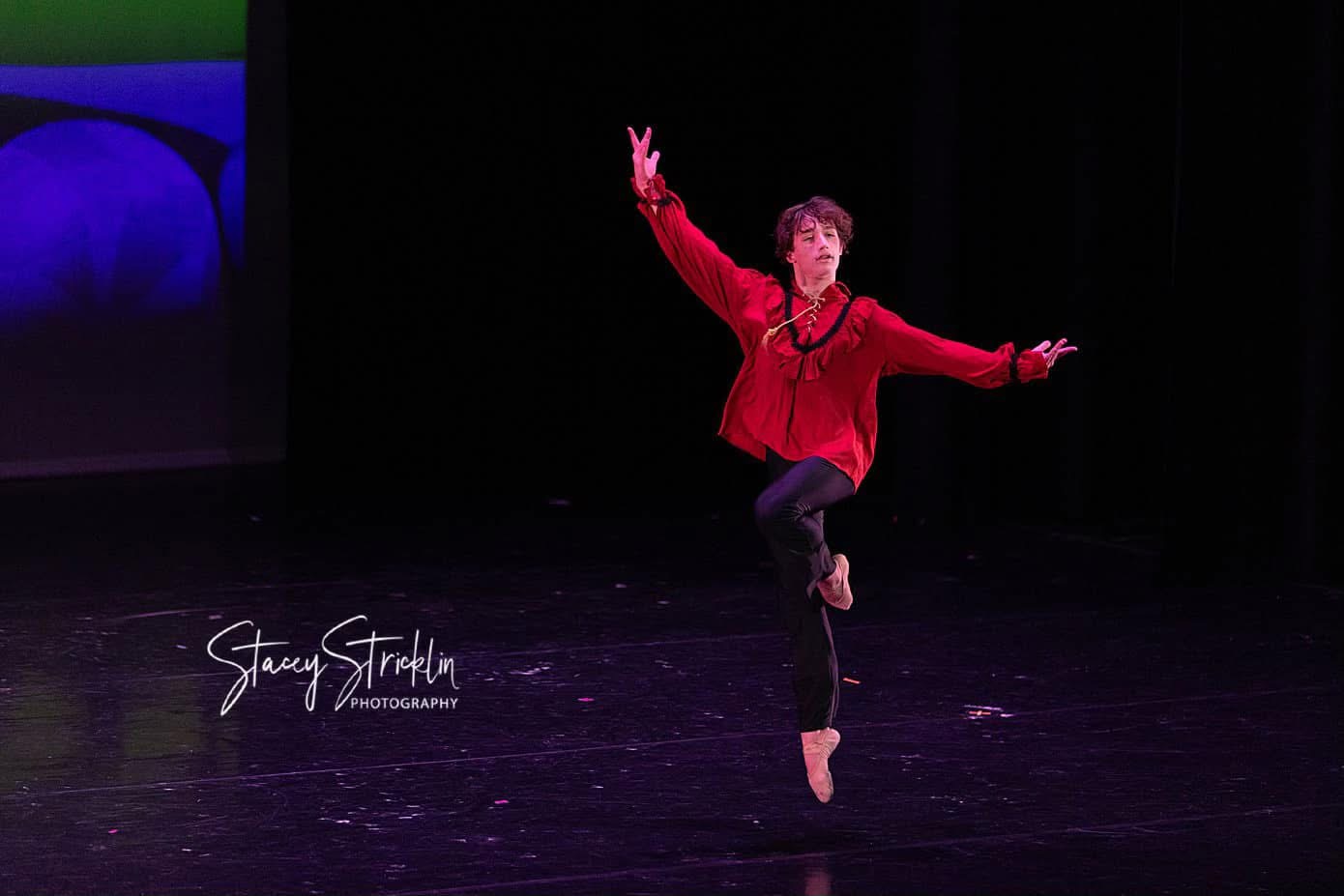 A line of ballet dancers performing together