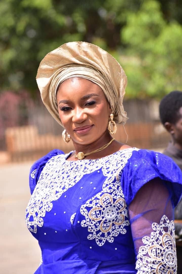 Mnena Ikondo Ikpa in a blue traditional dress