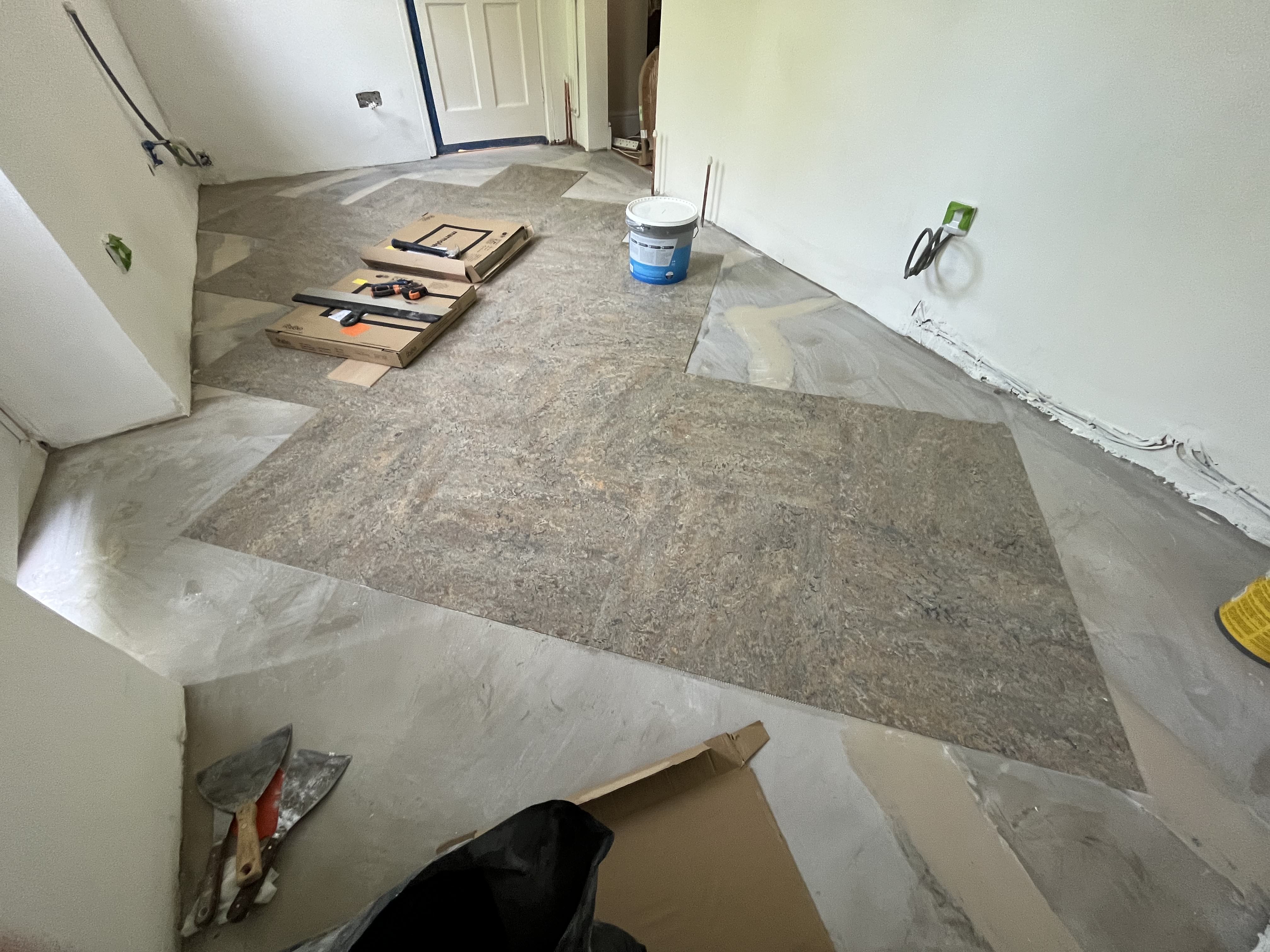 Herringbone floor installation in progress