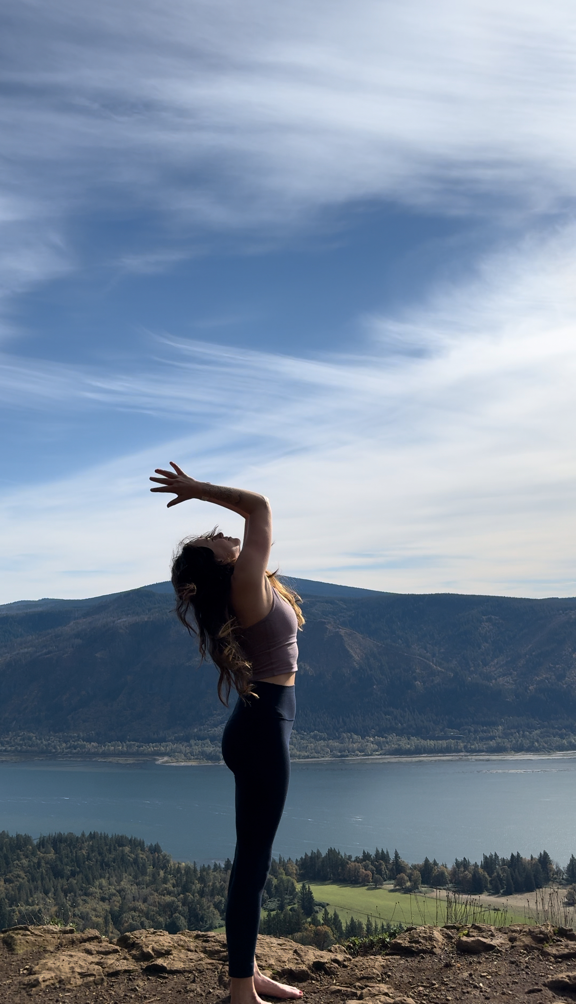 Becks practicing yoga overlooking the Columbia River Gorge