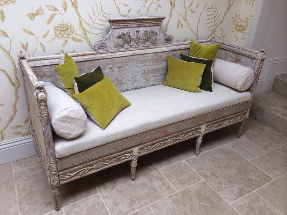 Vintage settee with botanical floral wallpaper