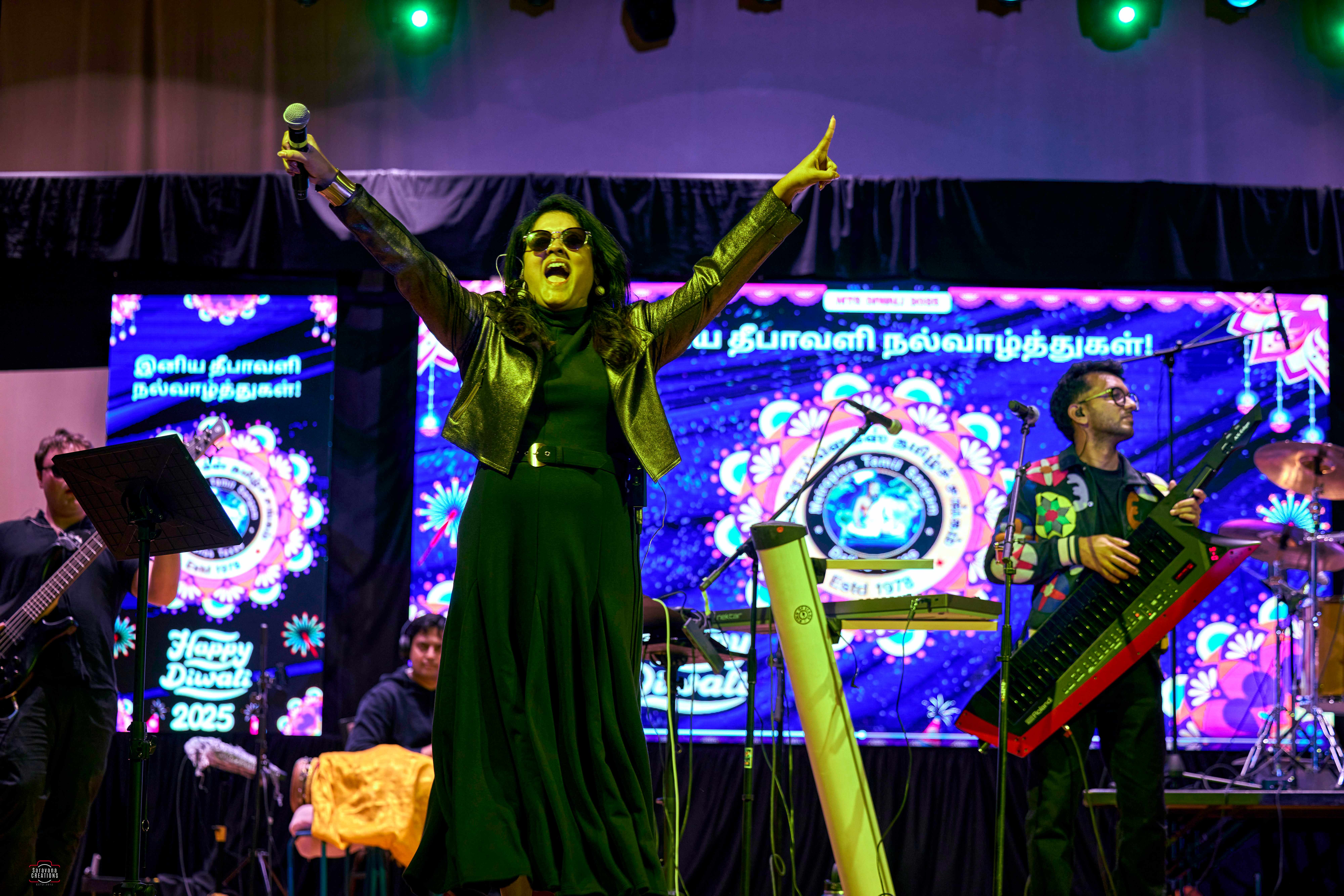 Female vocalist performing at Diwali celebration