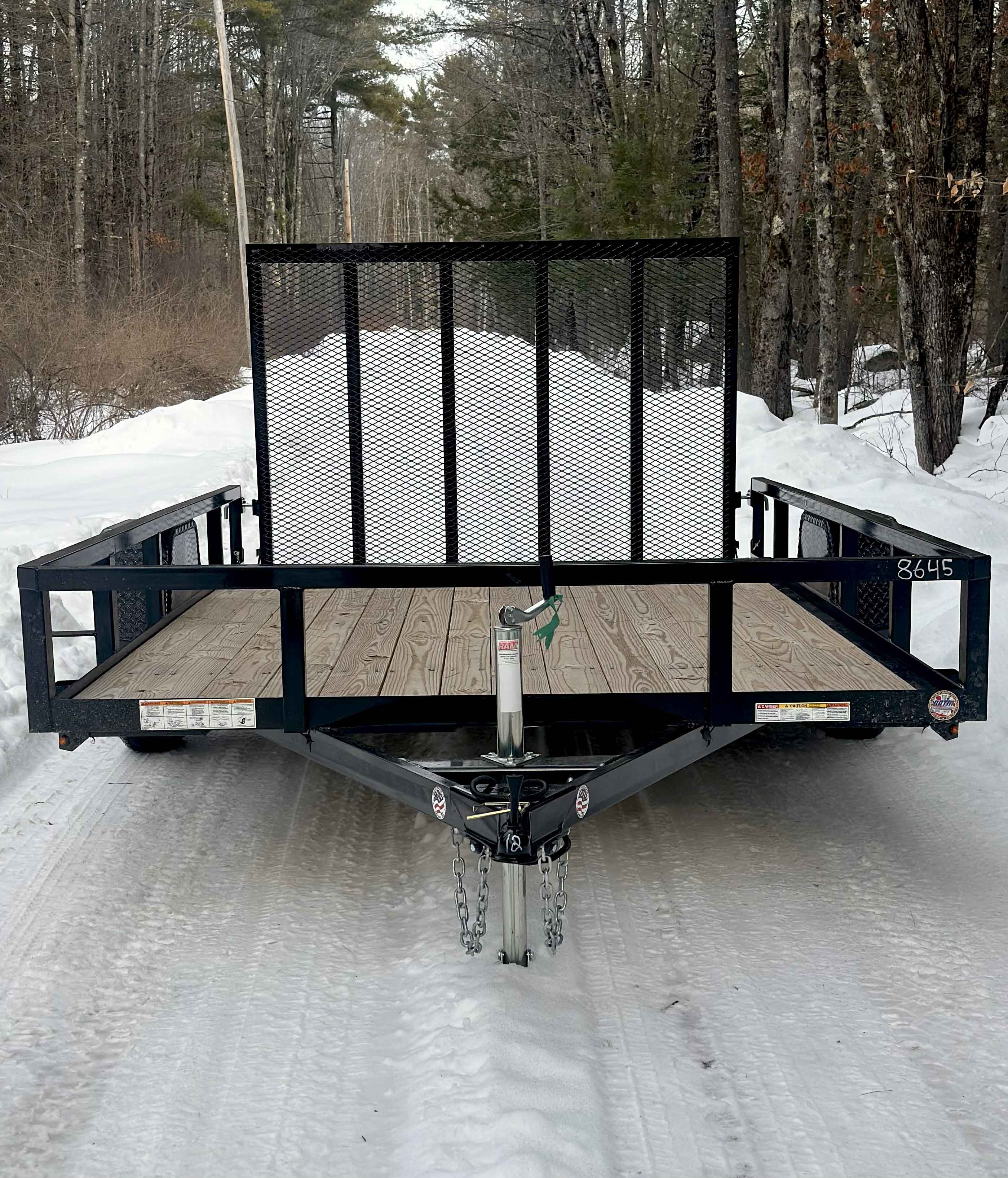 12ft Sure-Trec Utility Trailer - front view showing jack stand and mesh gate