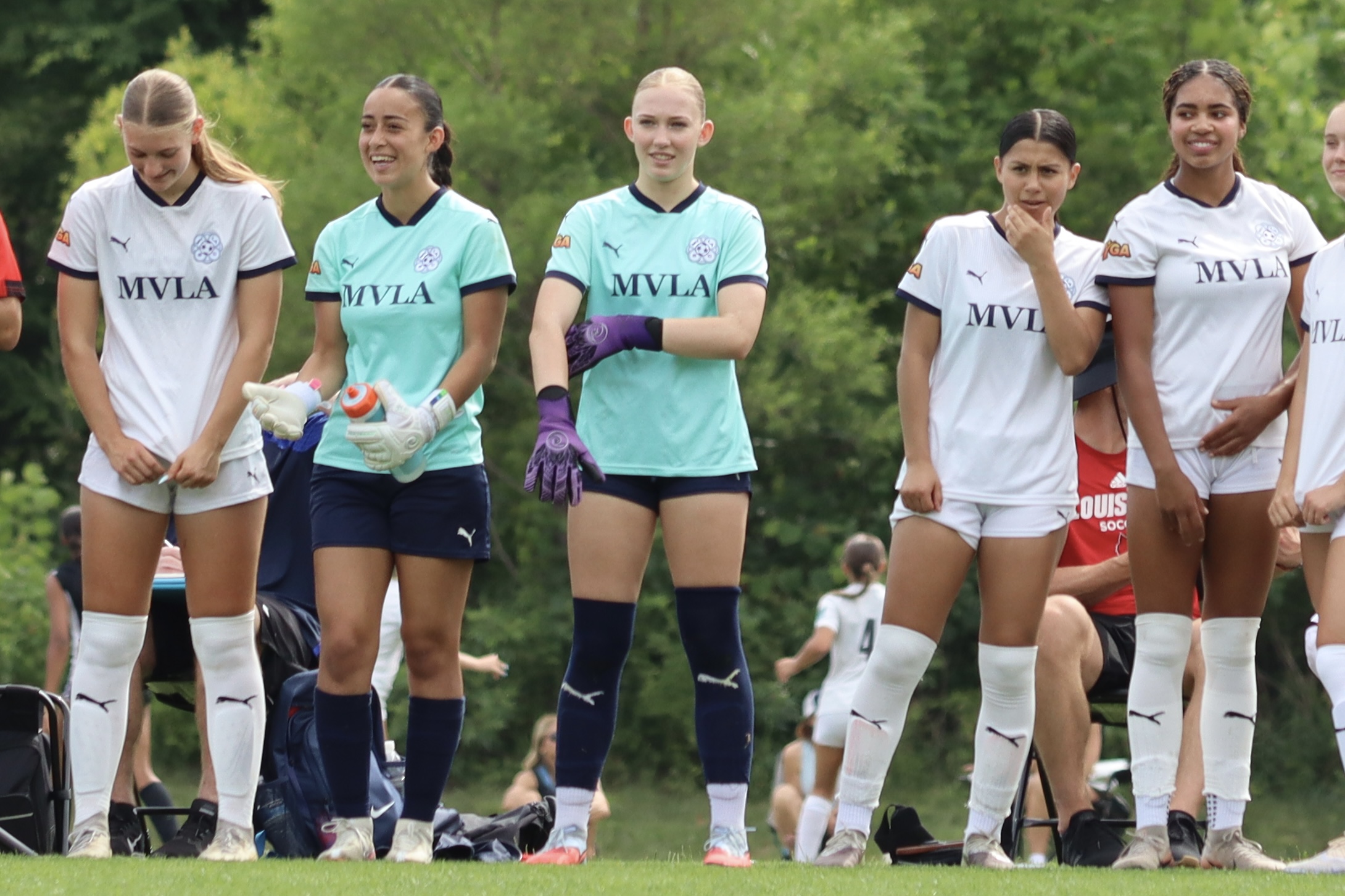 Players watching from the sideline