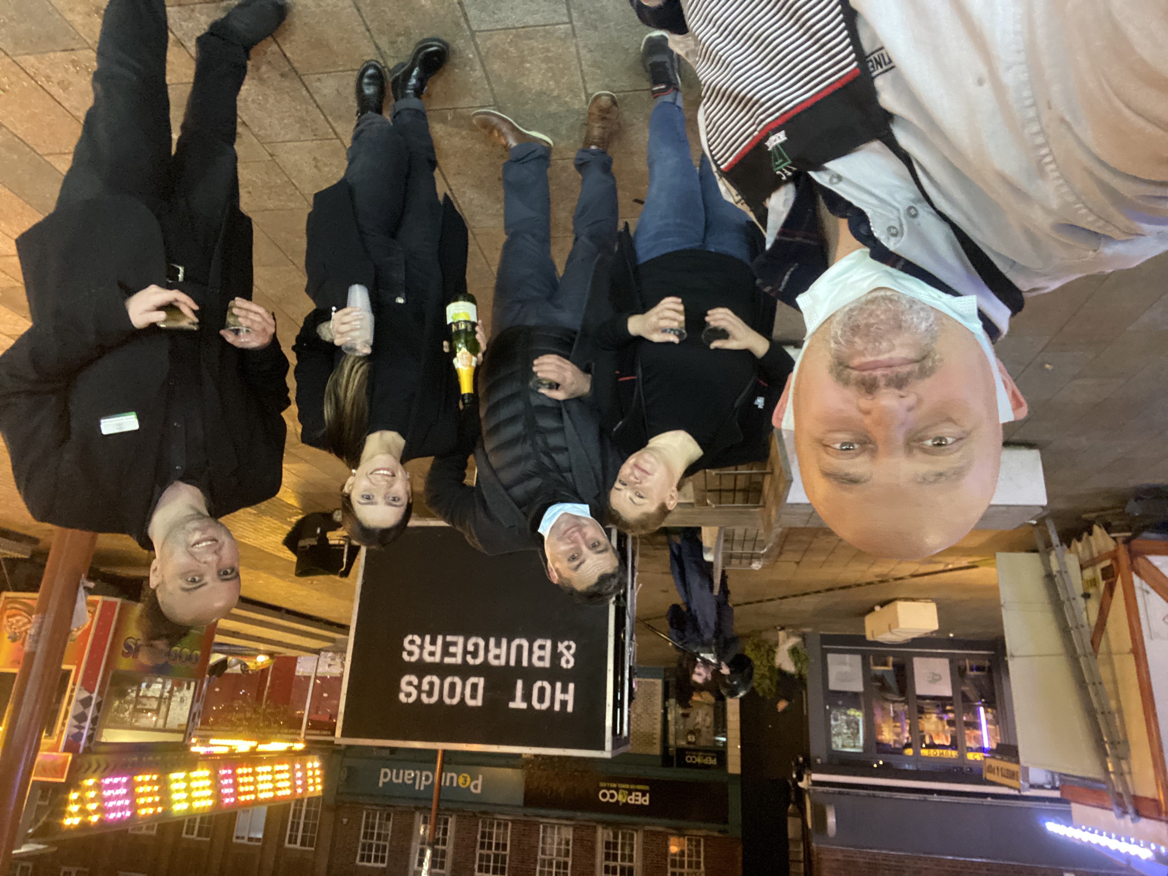 Team celebration at food stall opening