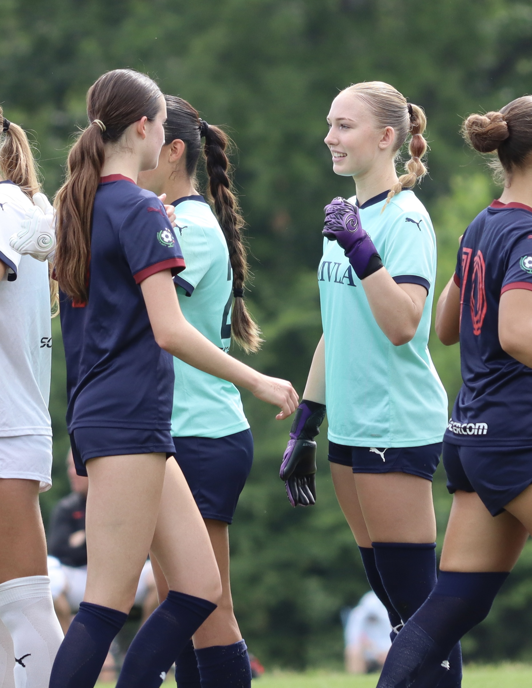 Goalkeeper talking with teammate