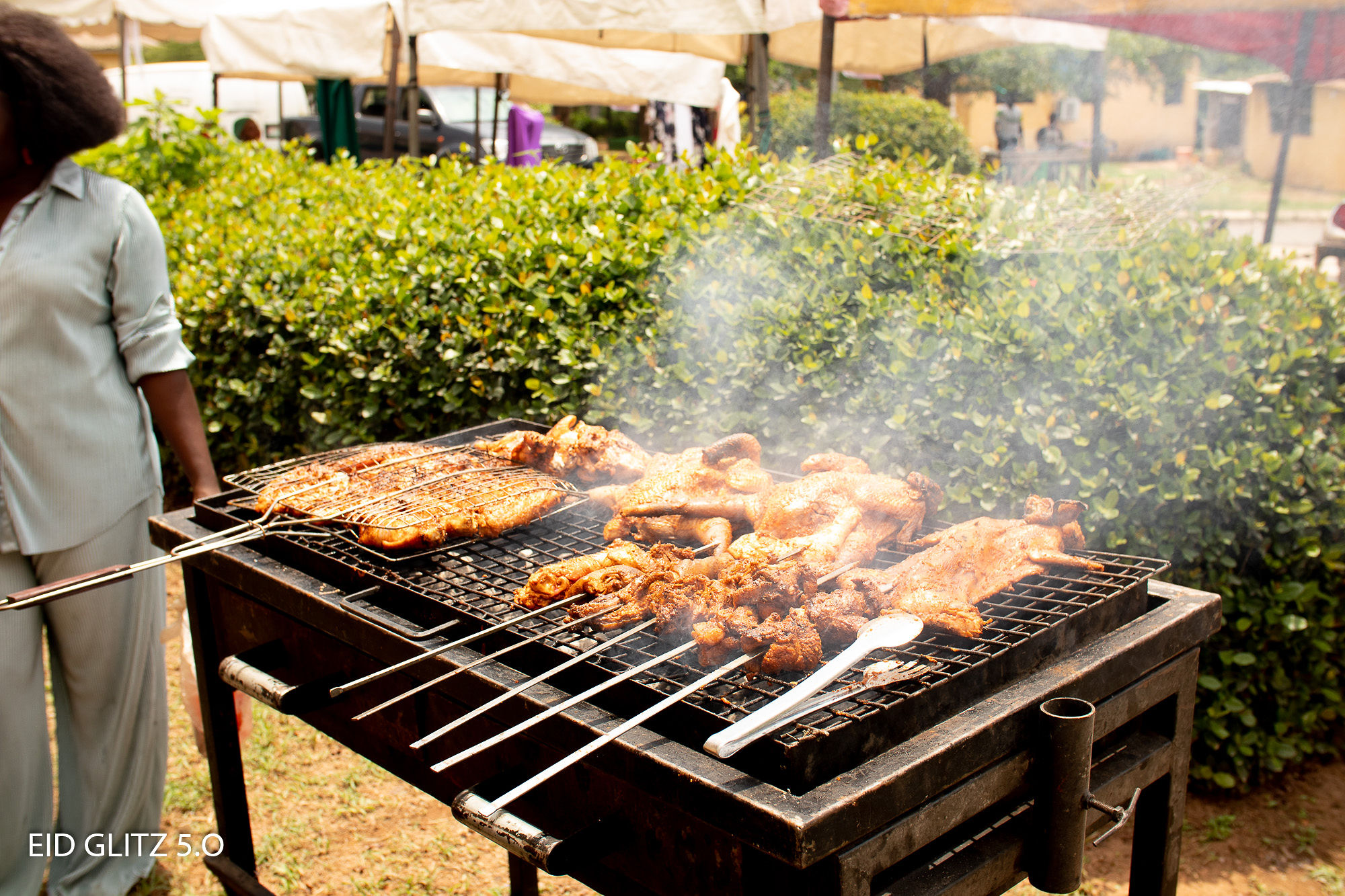 Delicious BBQ being prepared at EidGlitz, highlighting the food offerings