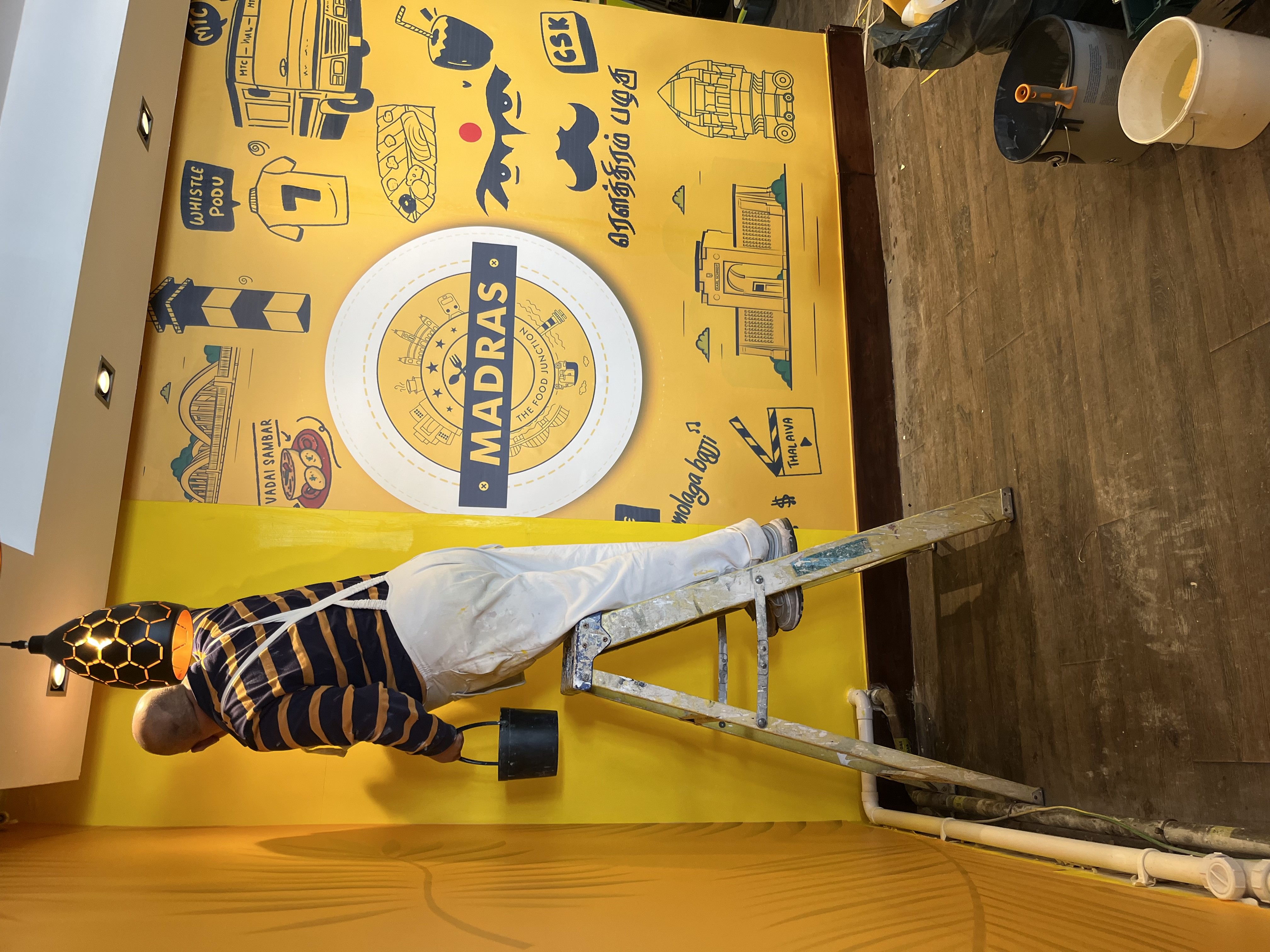 Custom Madras-themed mural installation