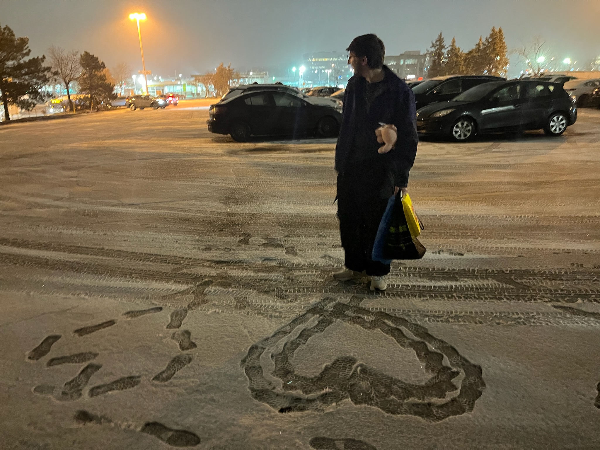 Team member in snowy evening