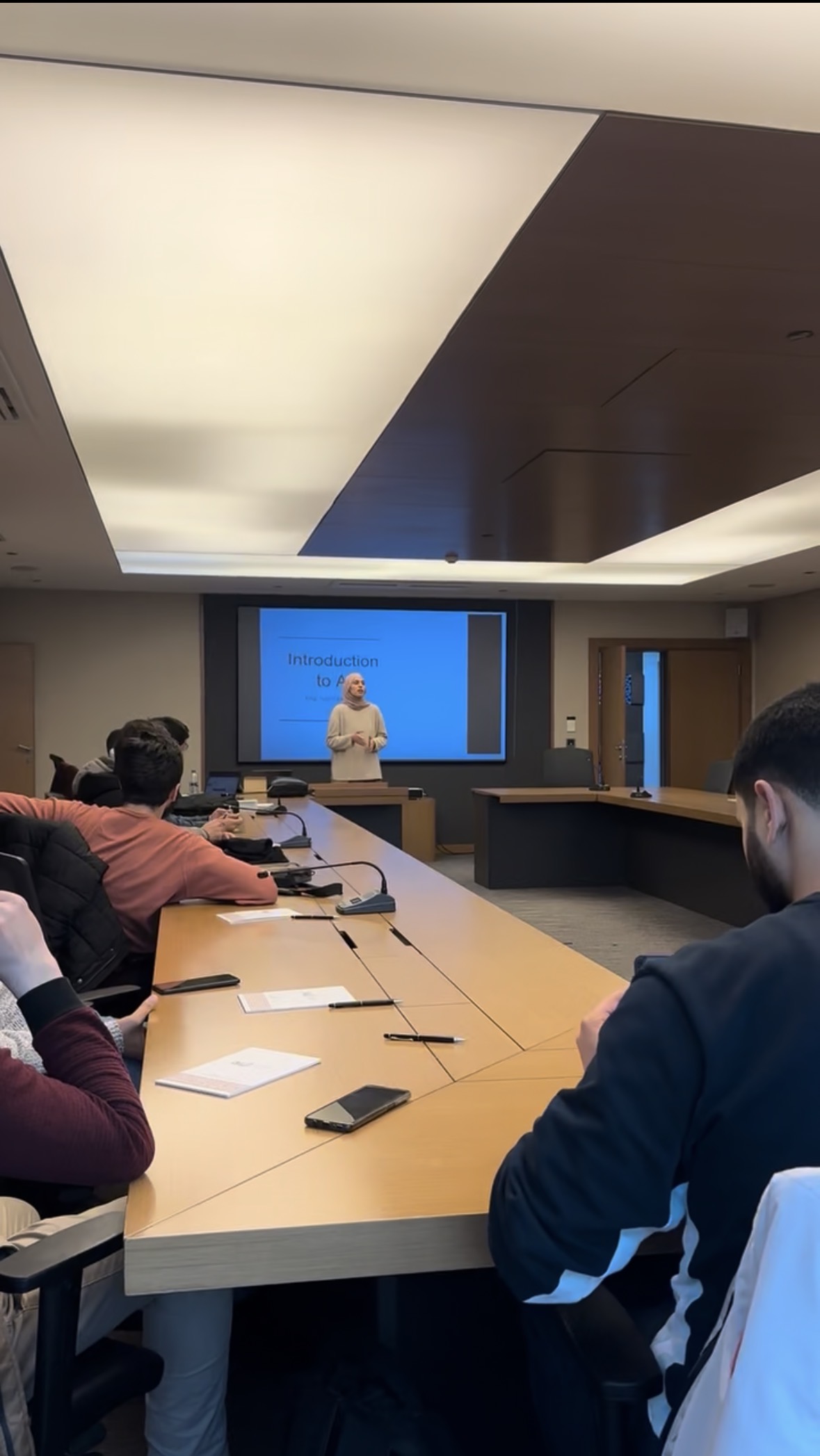 Introduction to AI presentation in a corporate conference room