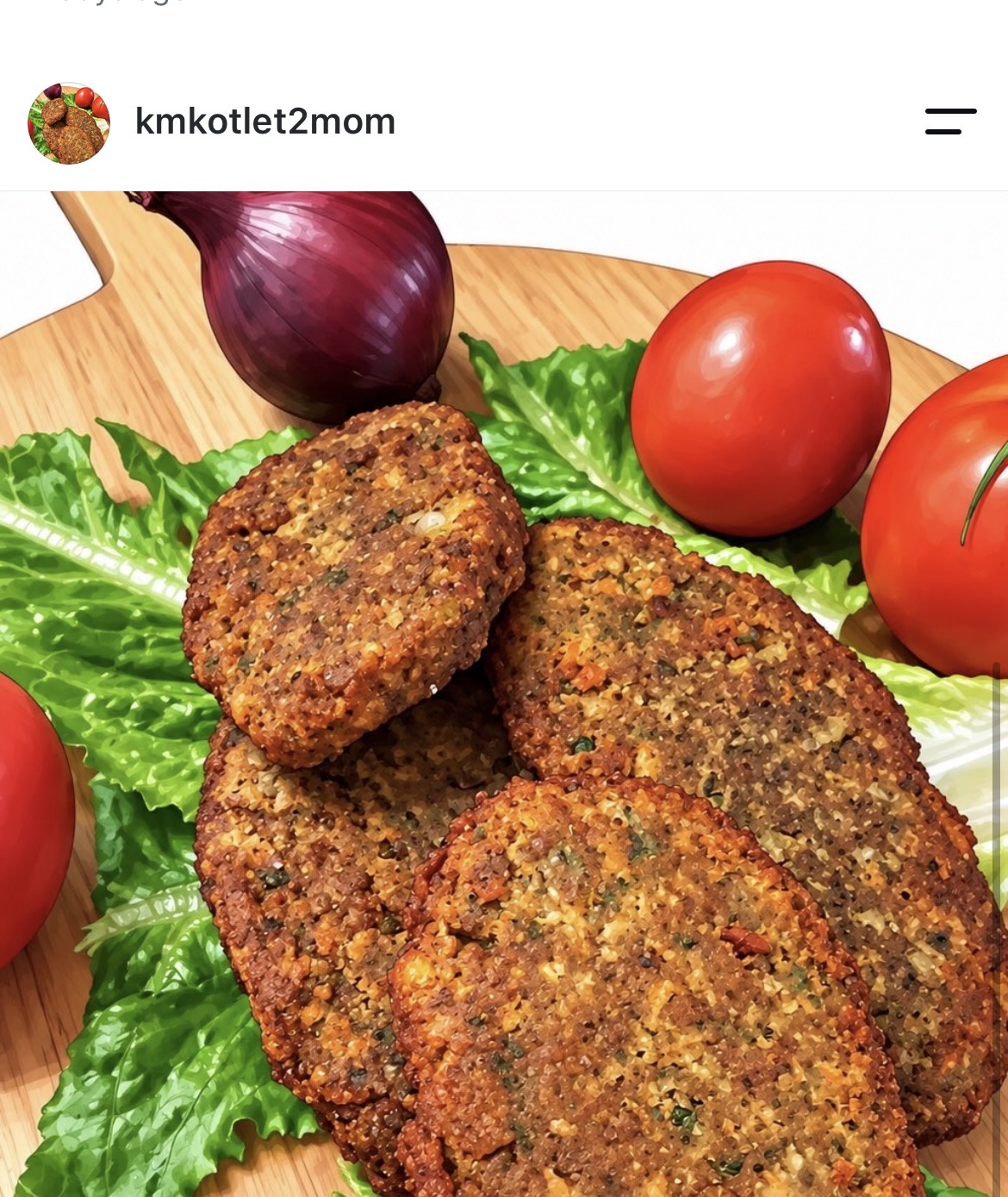 Golden seasoned patties with lettuce, tomato, and onion