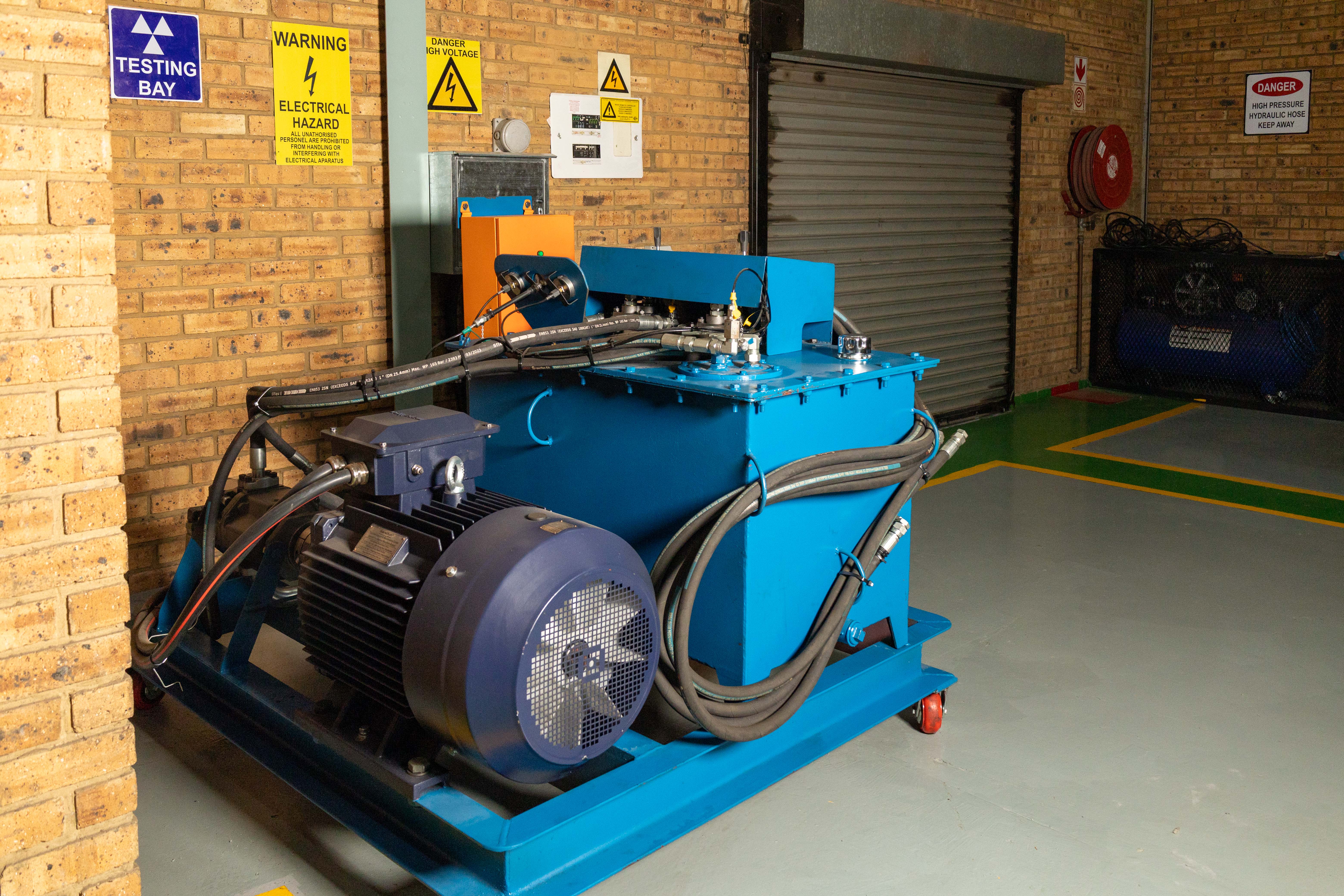 Blue hydraulic power pack built by Calric