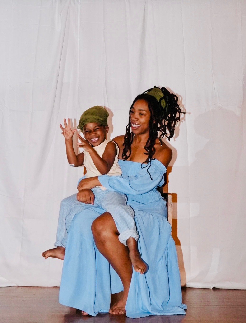Mel laughing with her son