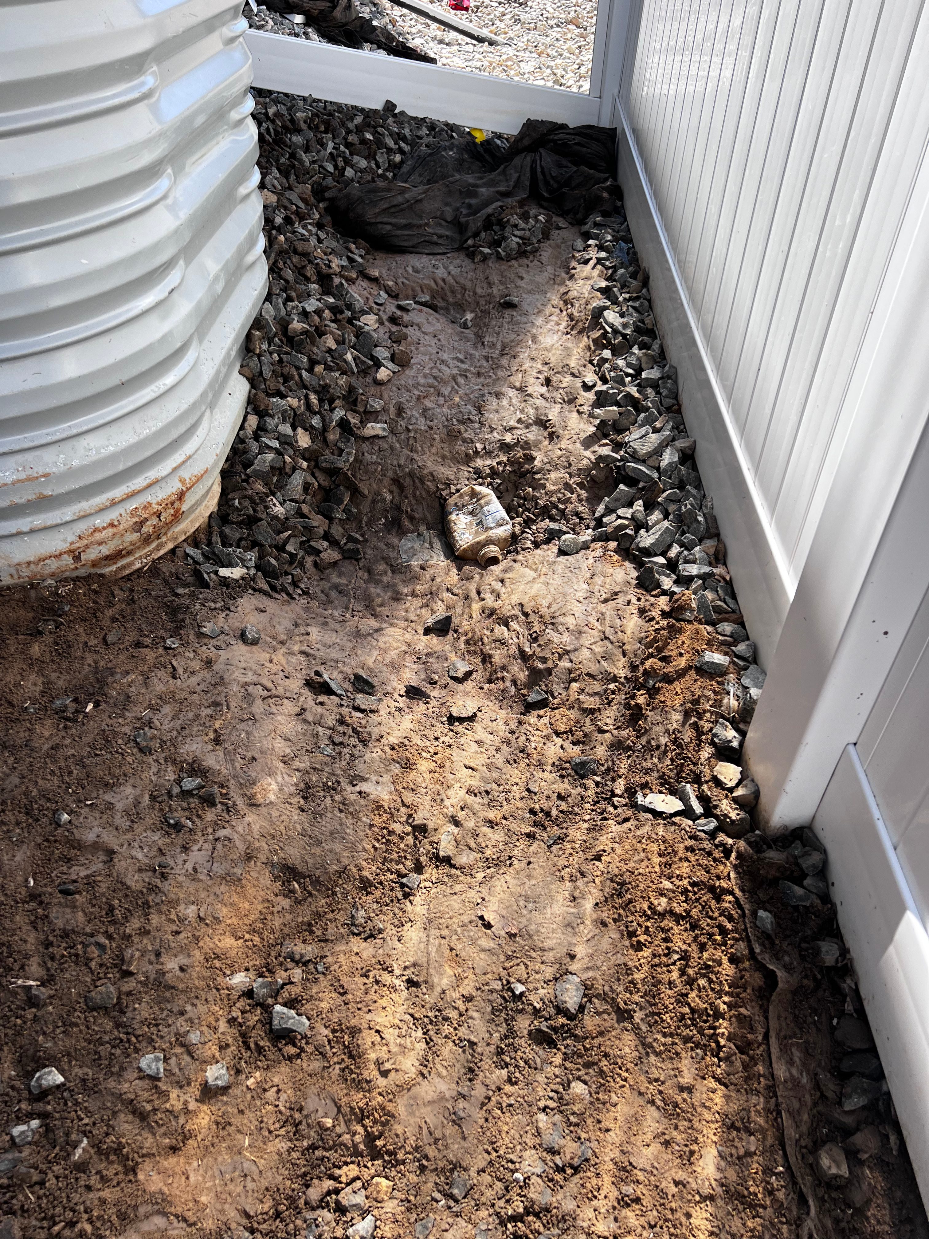 Foundation drainage work in progress with window well