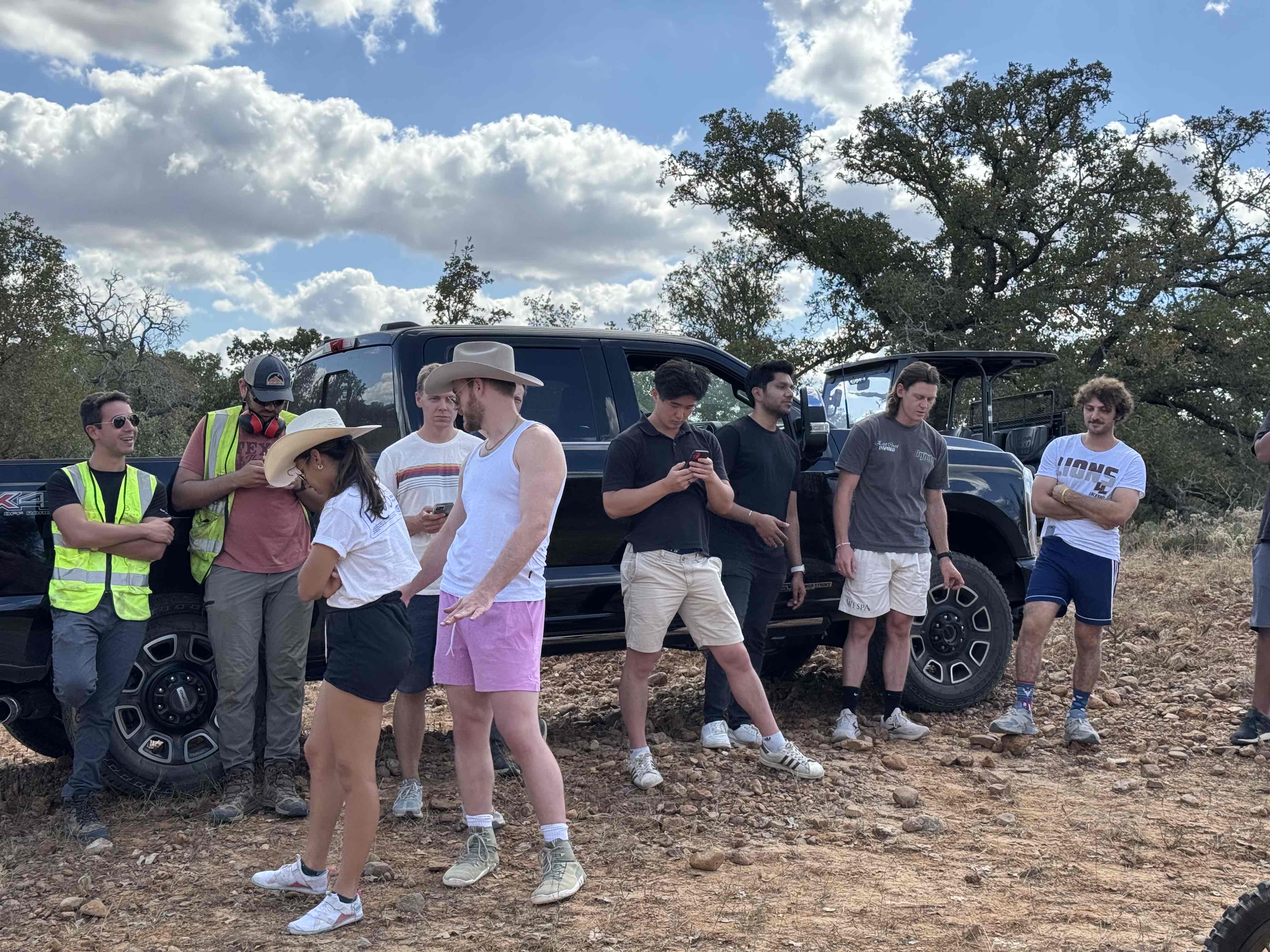 Group of attendees with off-road vehicles