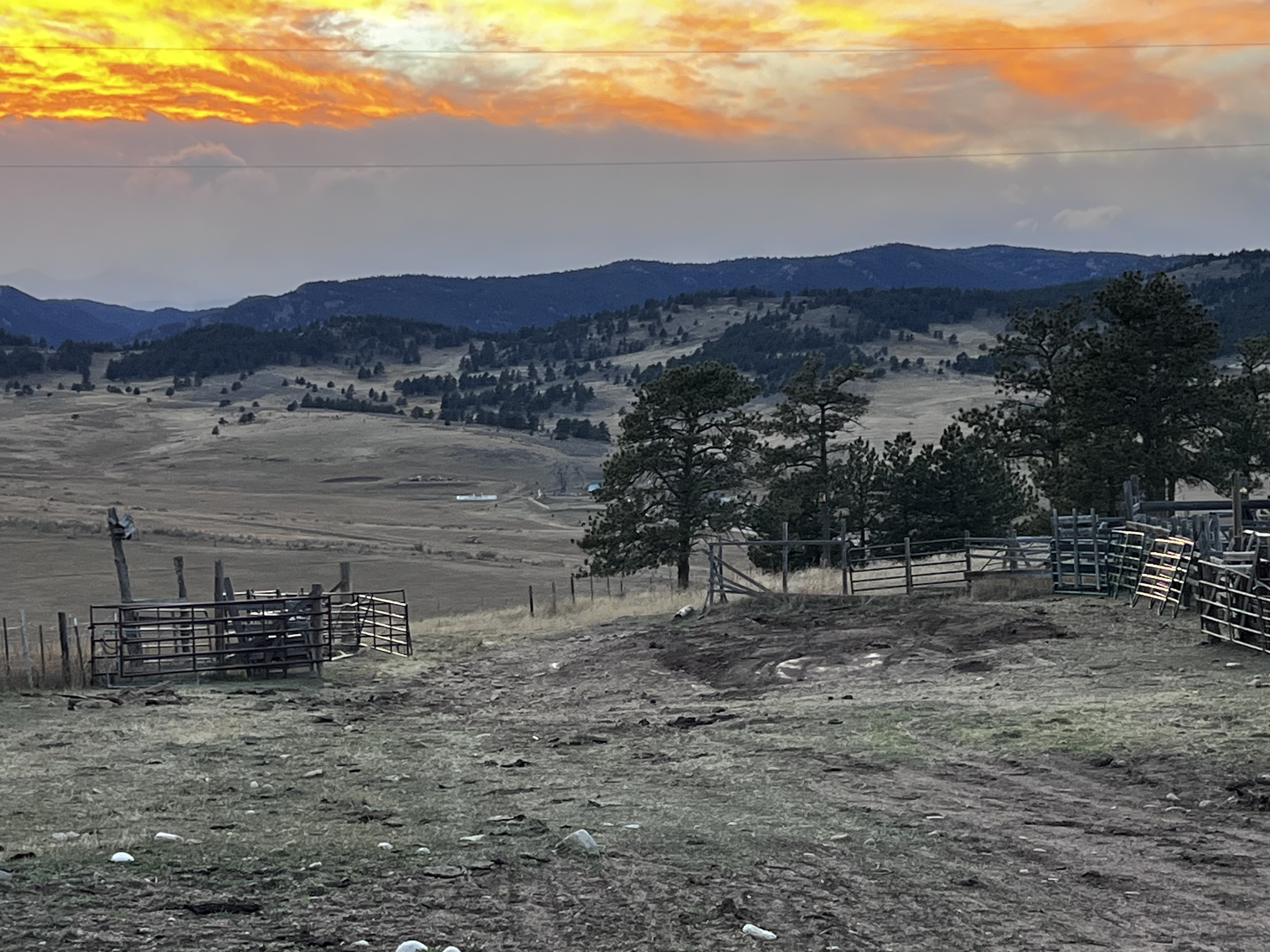 Colorado mountain ranch at sunset