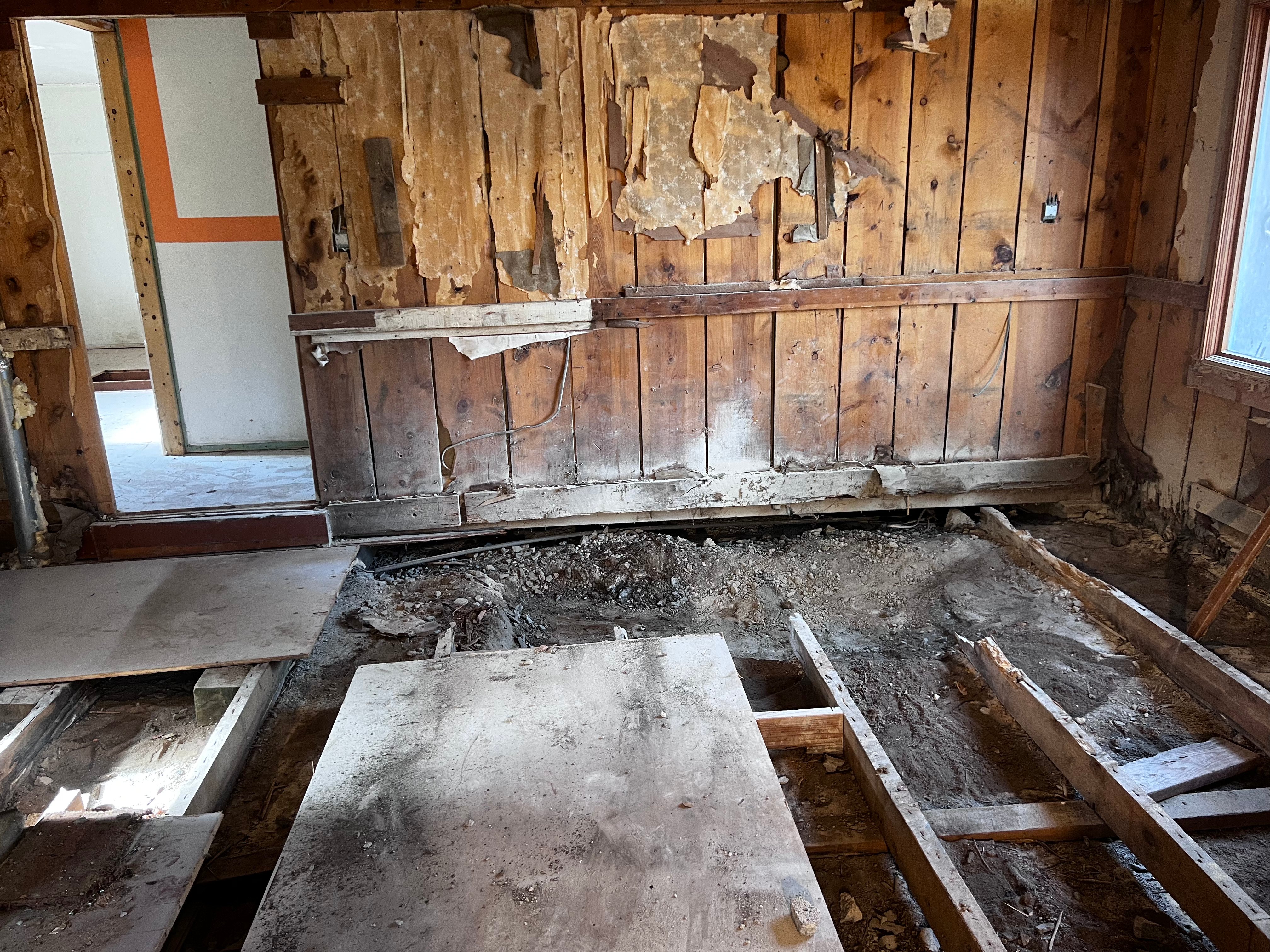 Interior demolition with floor and walls removed