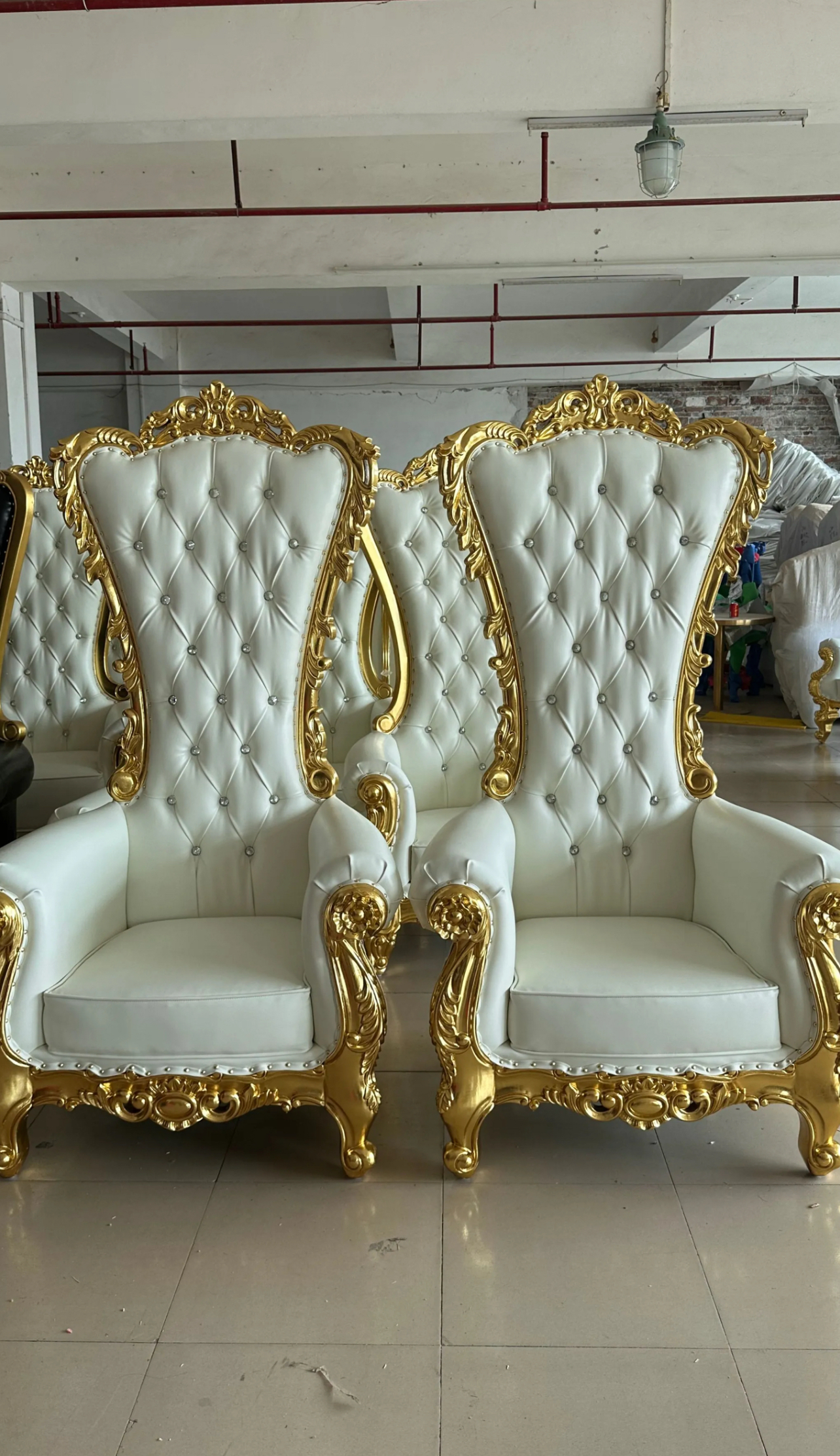 White tufted throne chairs with gold frame
