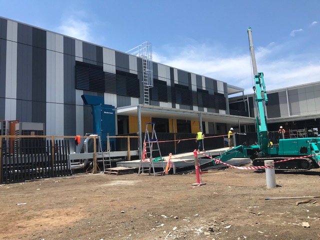 Steel framing along the exterior of a commercial building