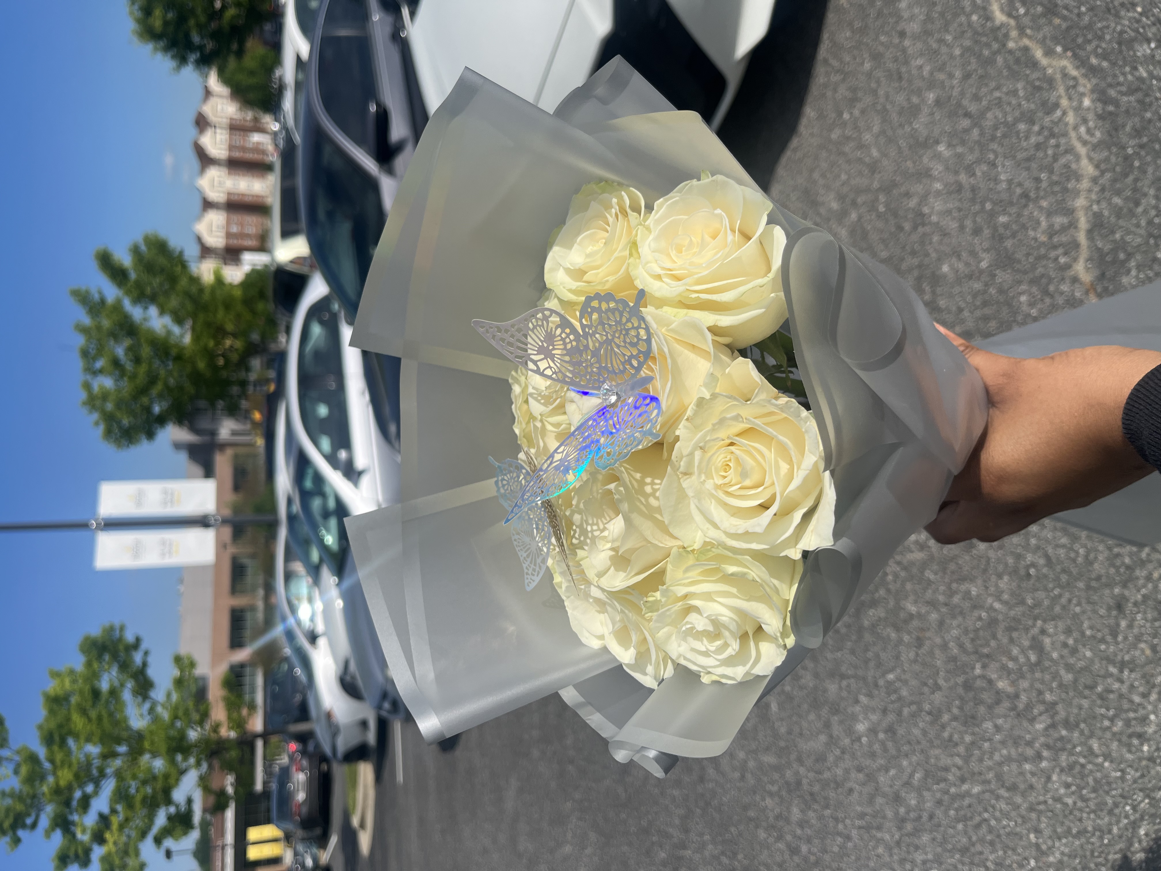 White roses with holographic butterfly