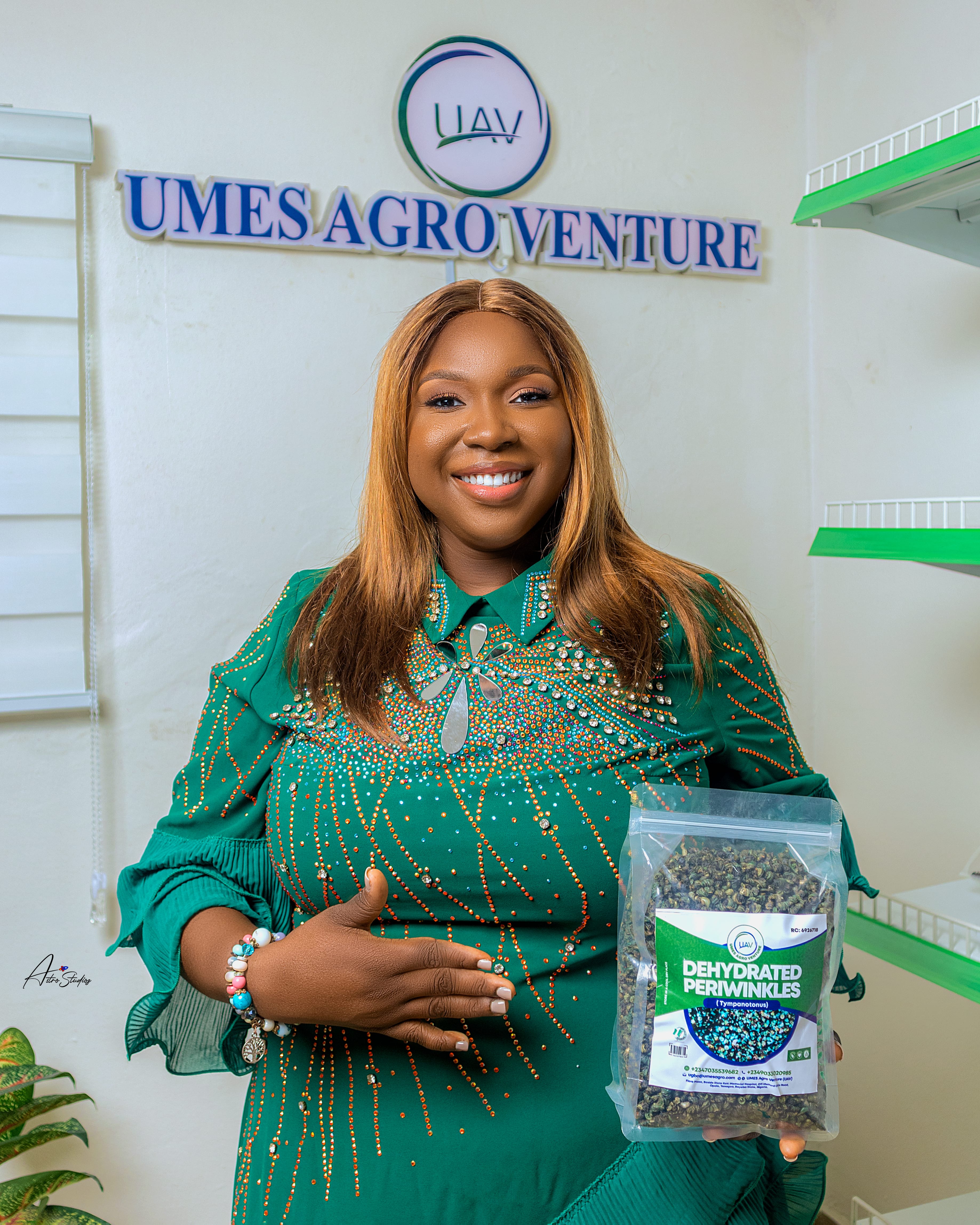 UPKM holding UAV Dehydrated Periwinkles product at the Umes Agro Venture office
