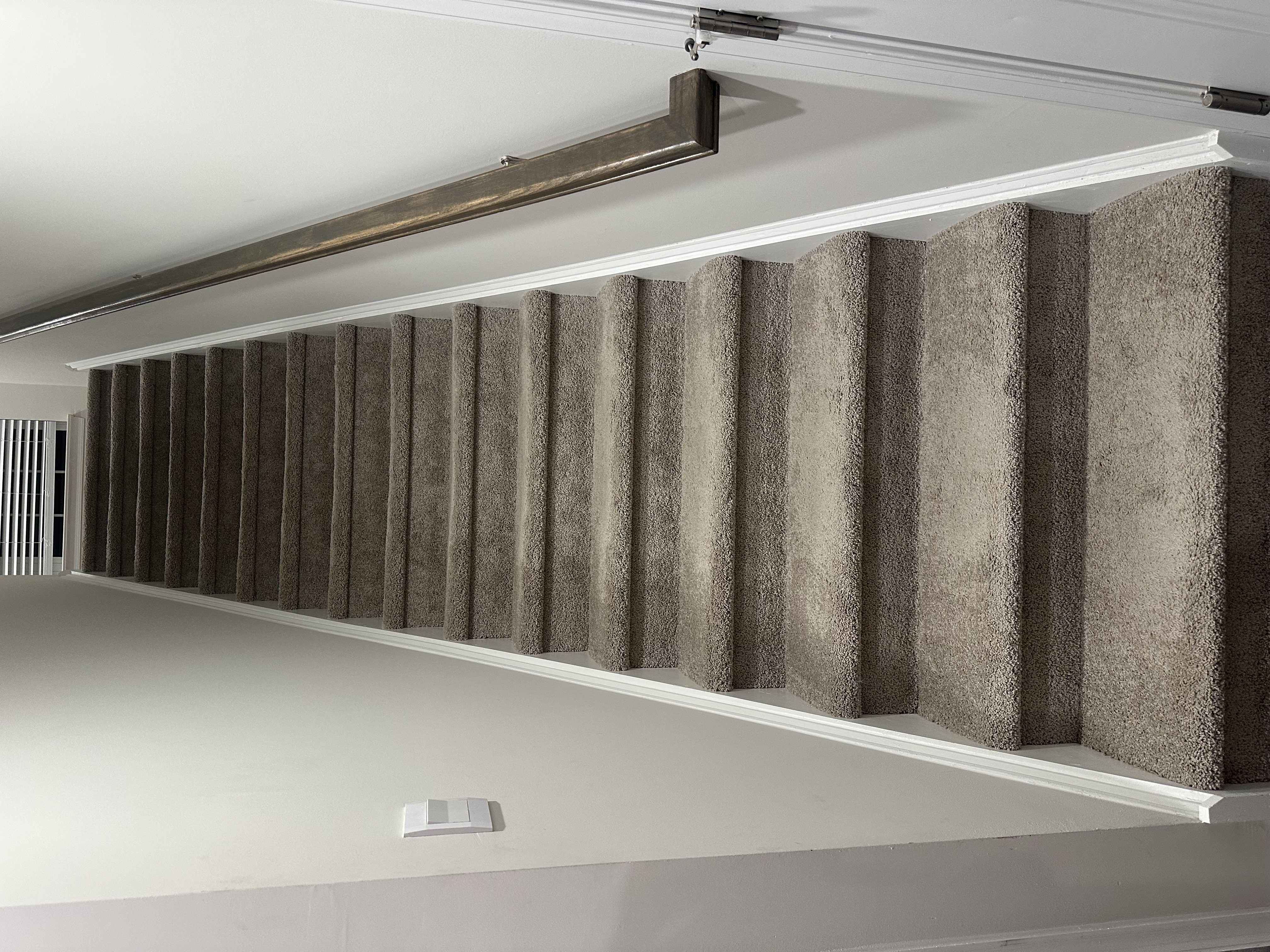 New carpet fitted neatly on a residential staircase