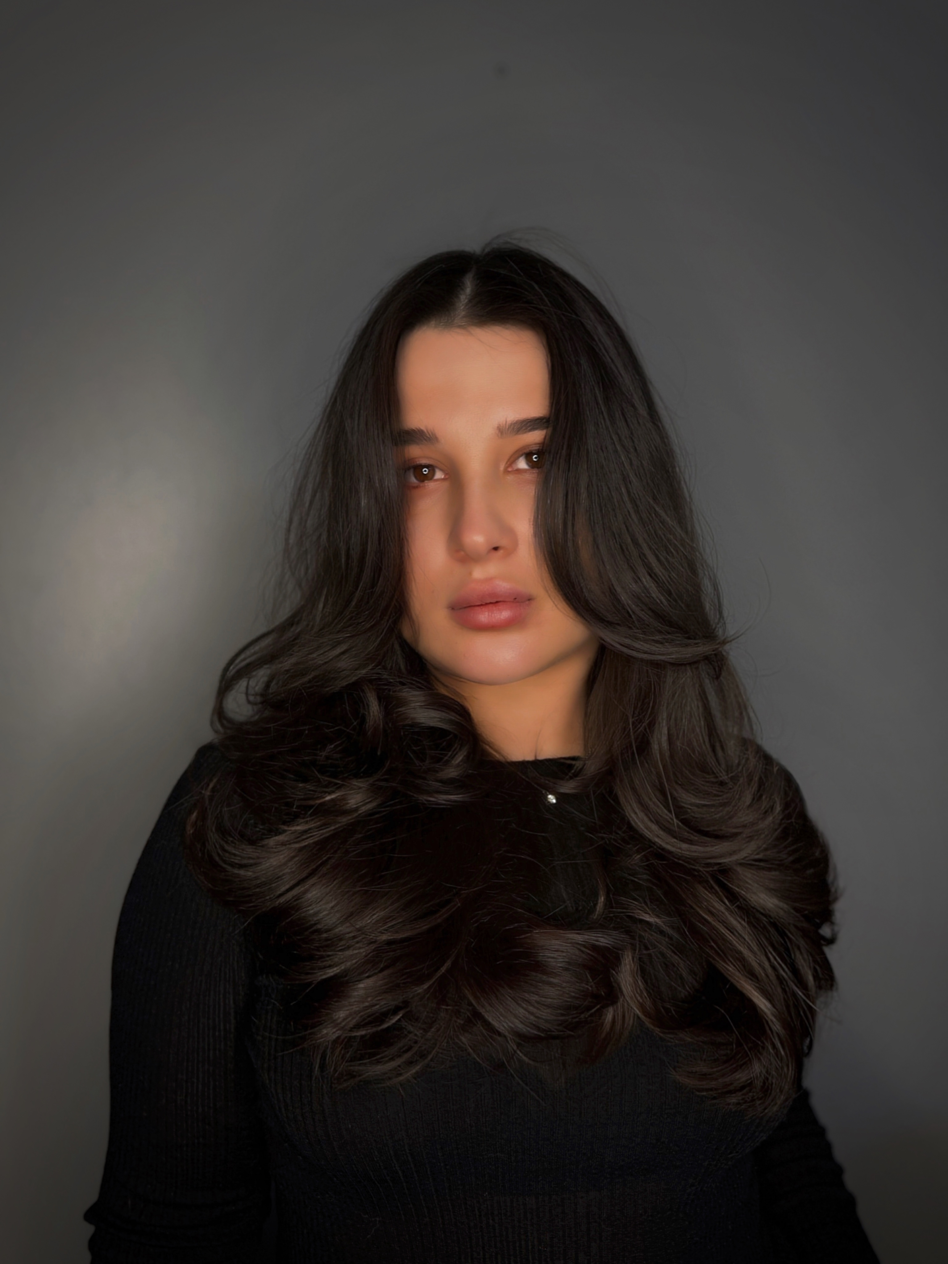 Long dark wavy hair styling