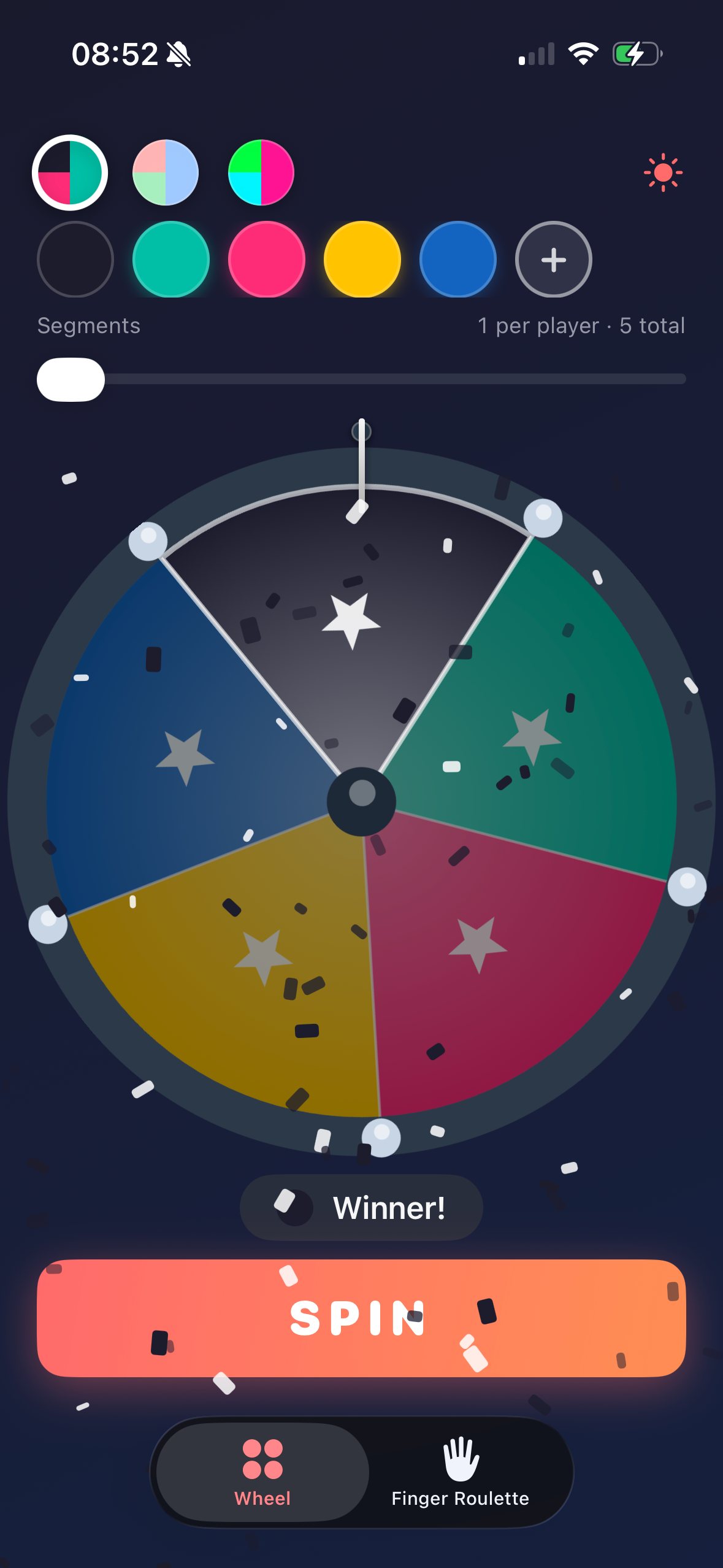 WinSpins app showing the colorful spin wheel with confetti celebration