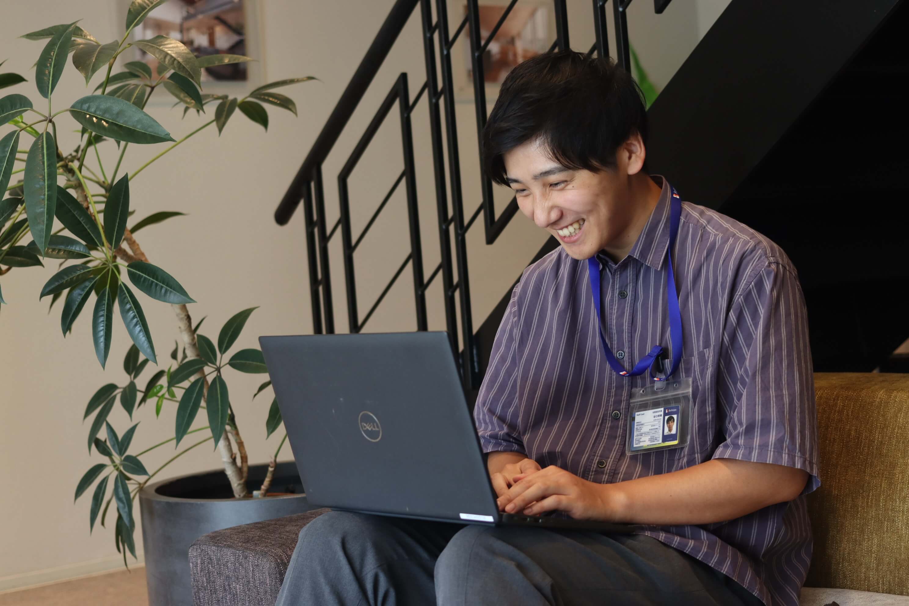 Employee working on laptop in office