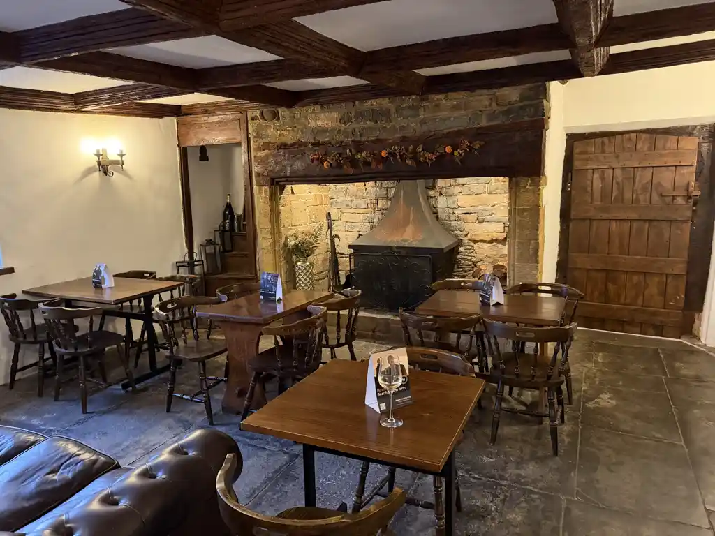 Dining room with fireplace and oak door - variation 2