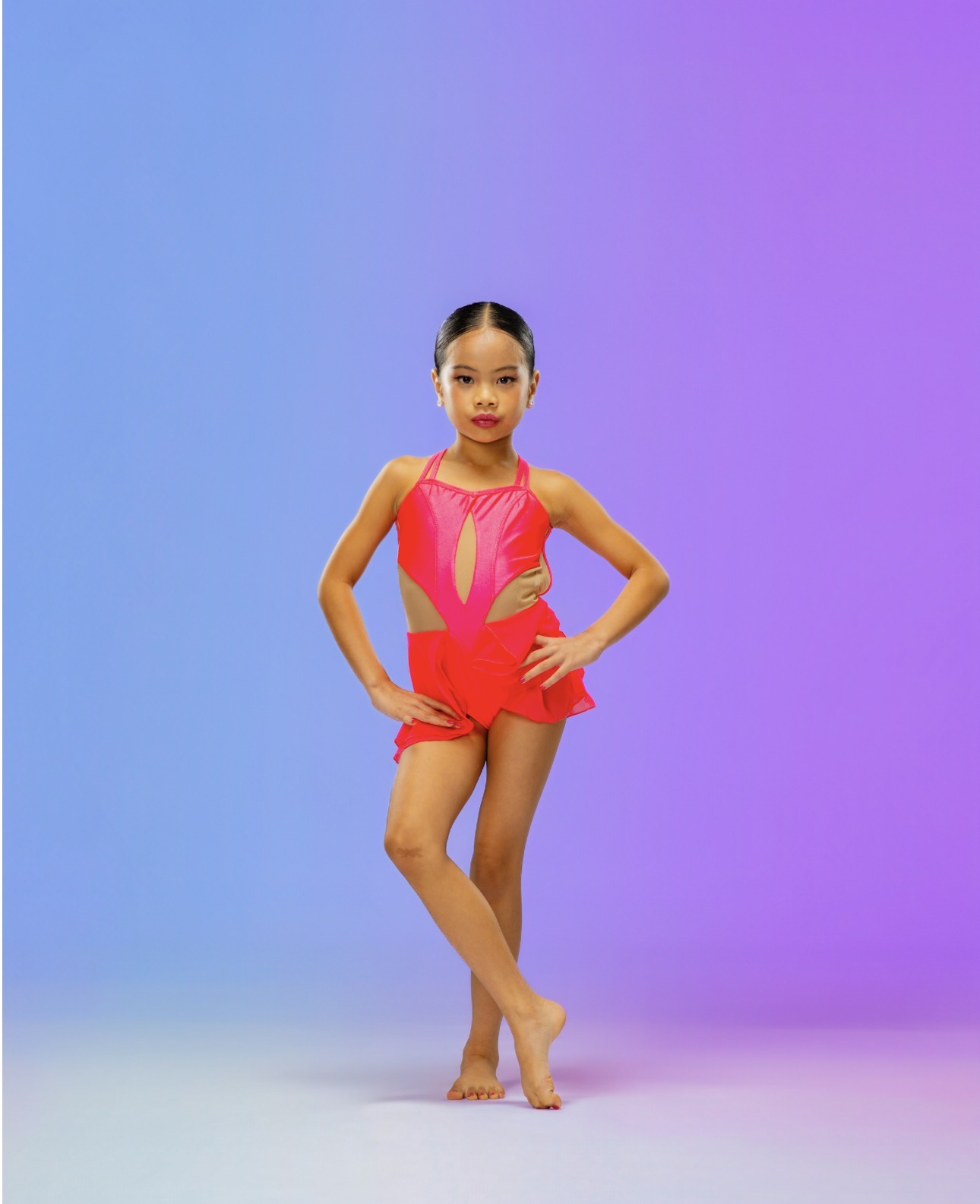 Pichara Luong modeling a red dance costume for a kids fashion campaign